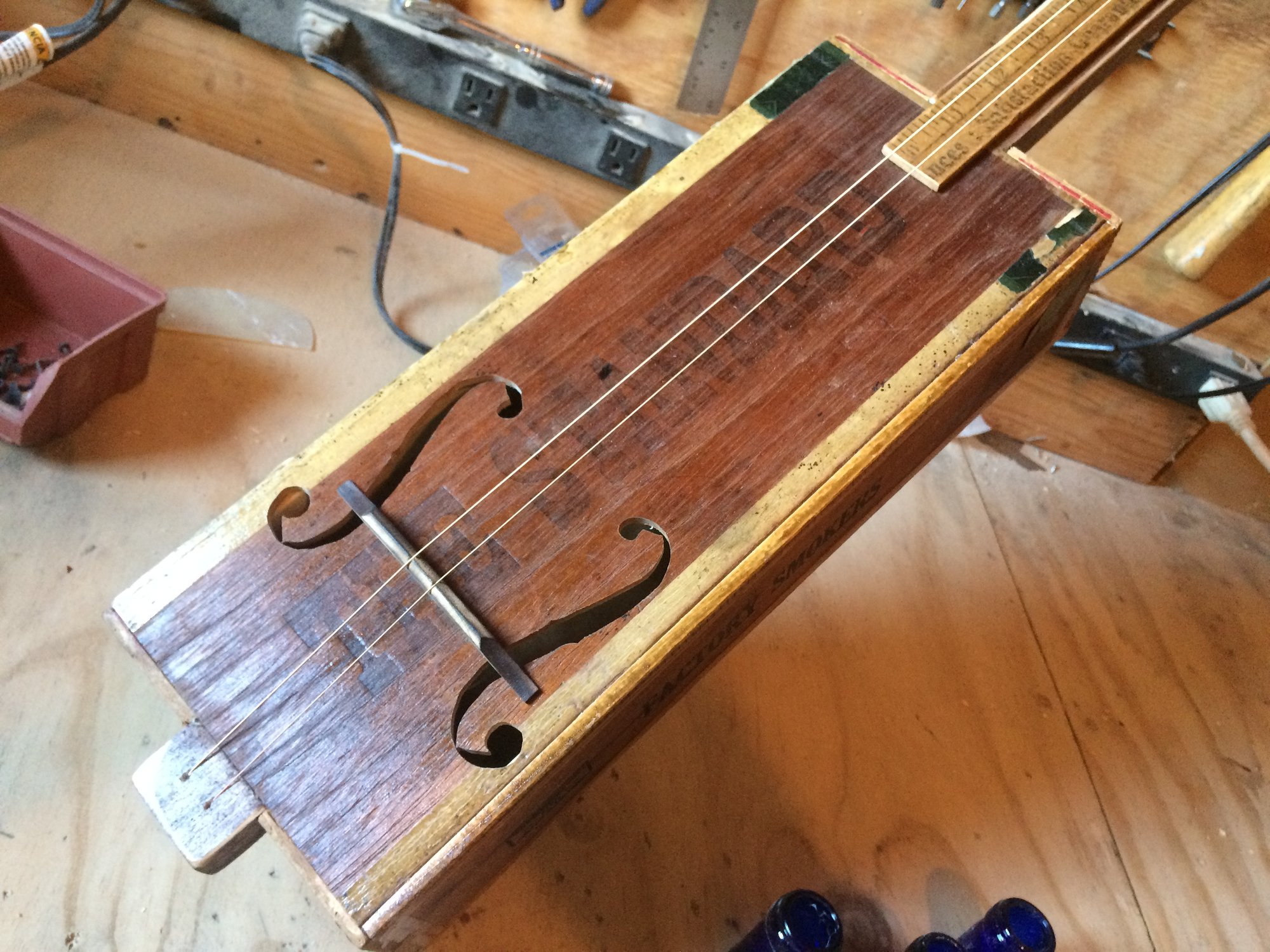 This guitar is made from a century-old cigar box