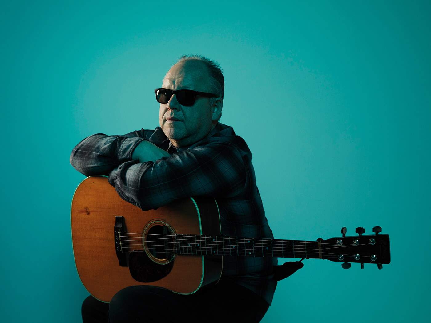 Pixies Black Francis landscape shot elbows on guitar