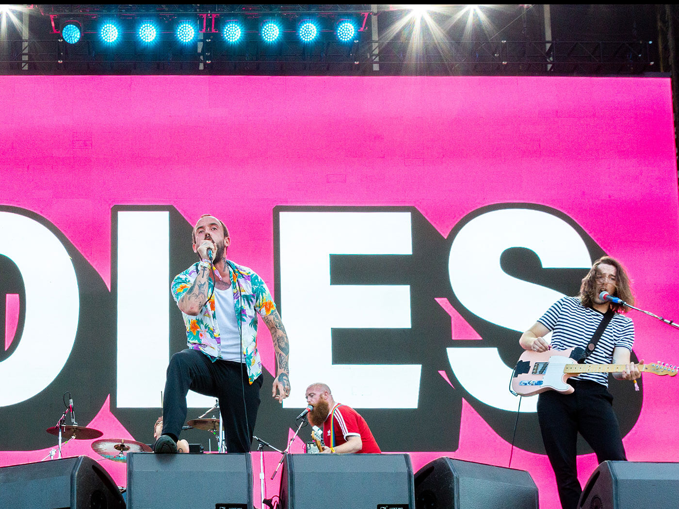 Idles performing live.