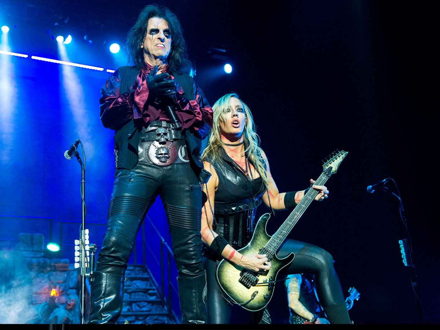 Alice Cooper performing with Nita Strauss