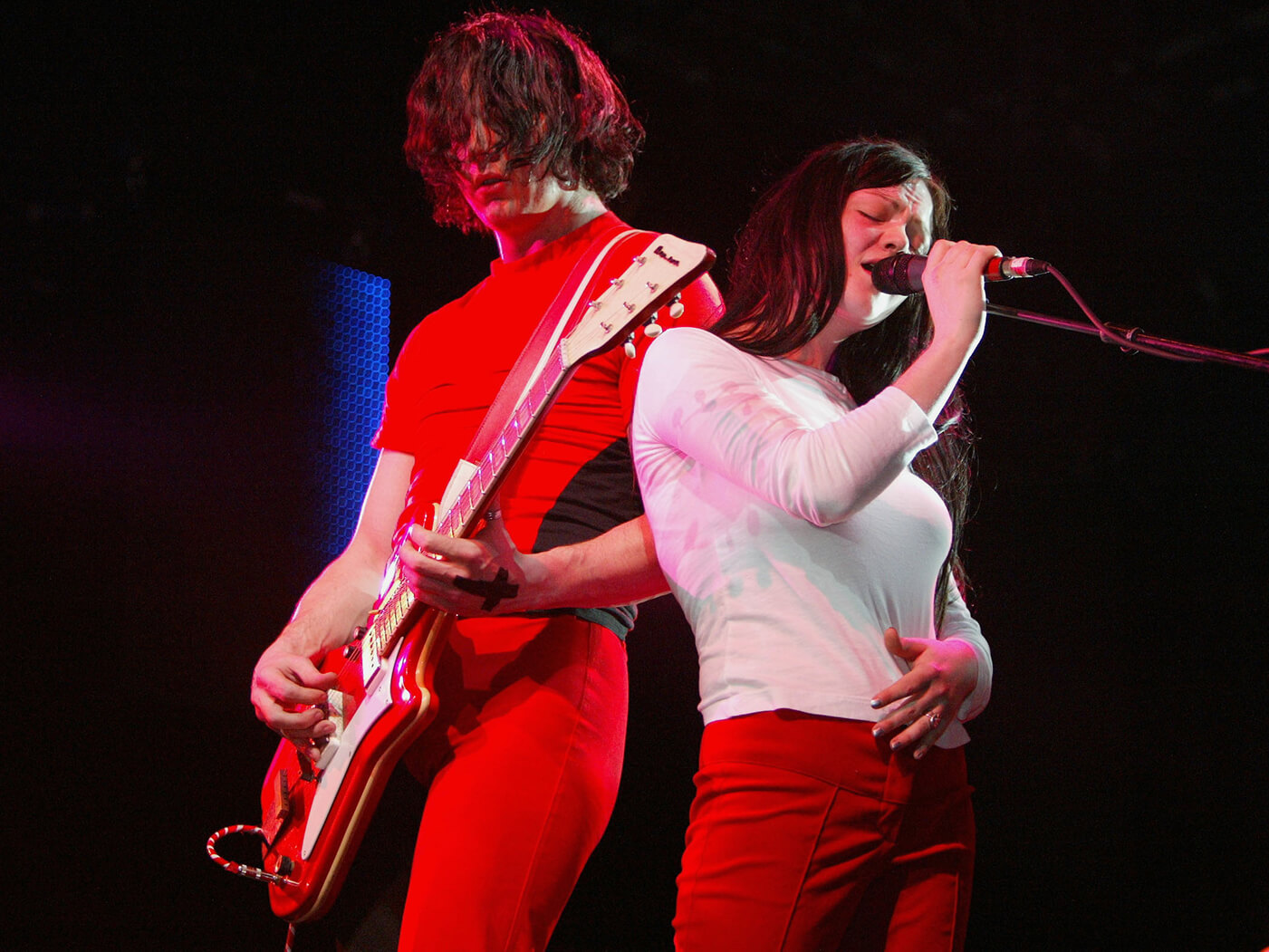 Jack and Meg White of The White Stripes performing in 2003 by Jon Super/Redferns via Getty Images