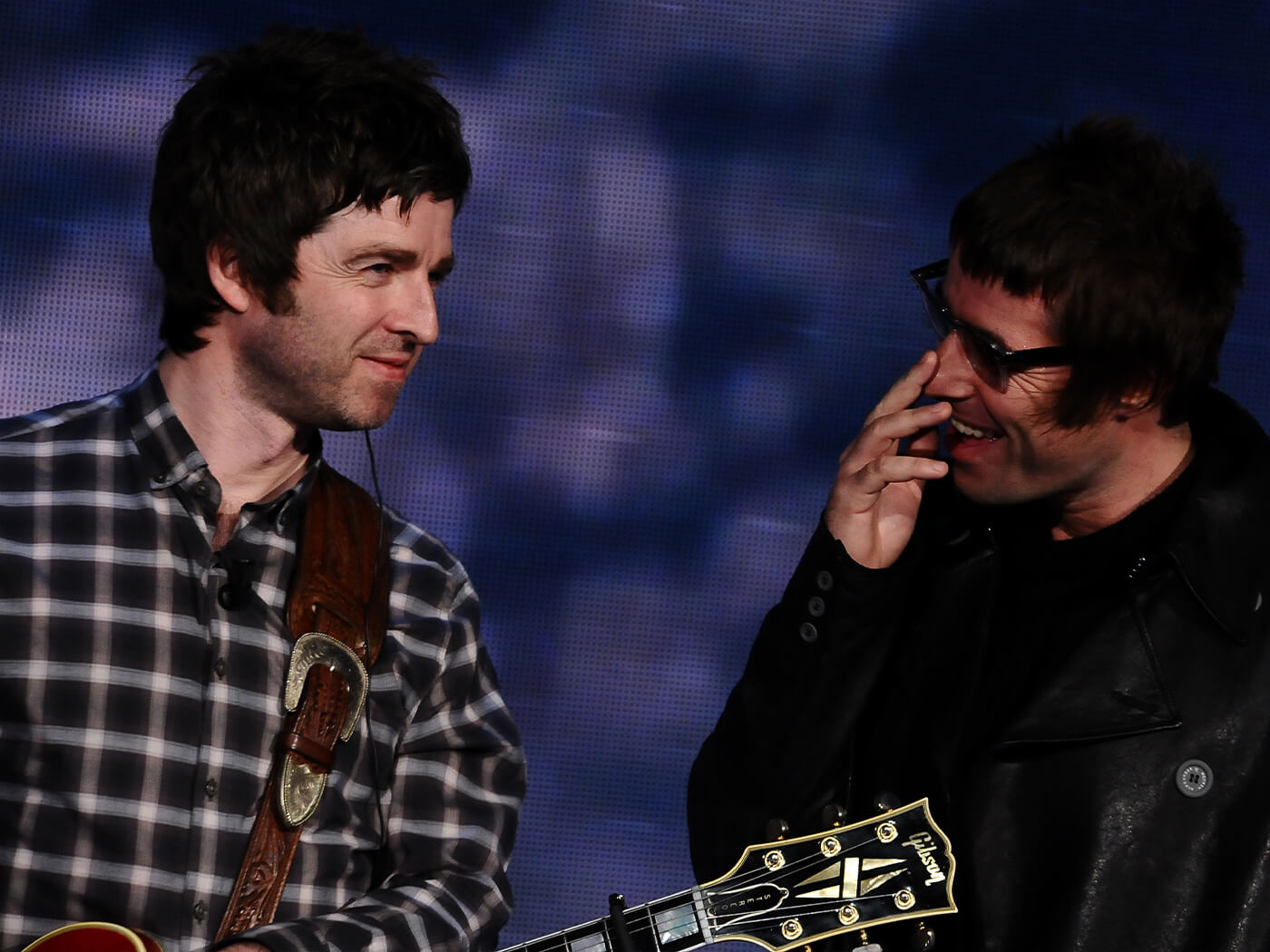 Noel and Liam Gallagher onstage