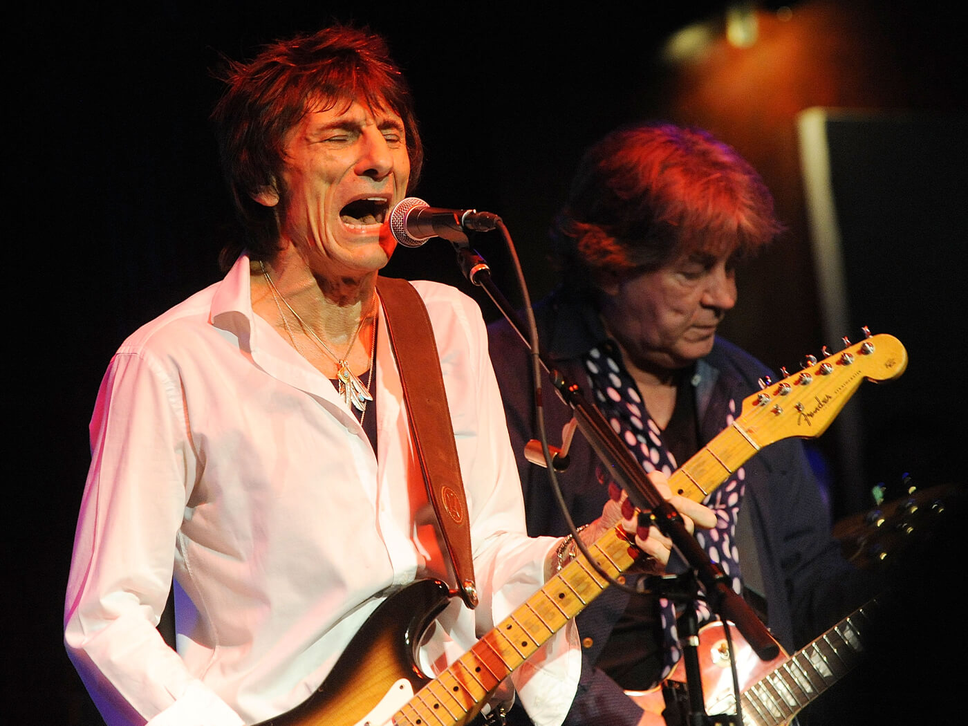 Ronnie Wood with Mick Taylor onstage