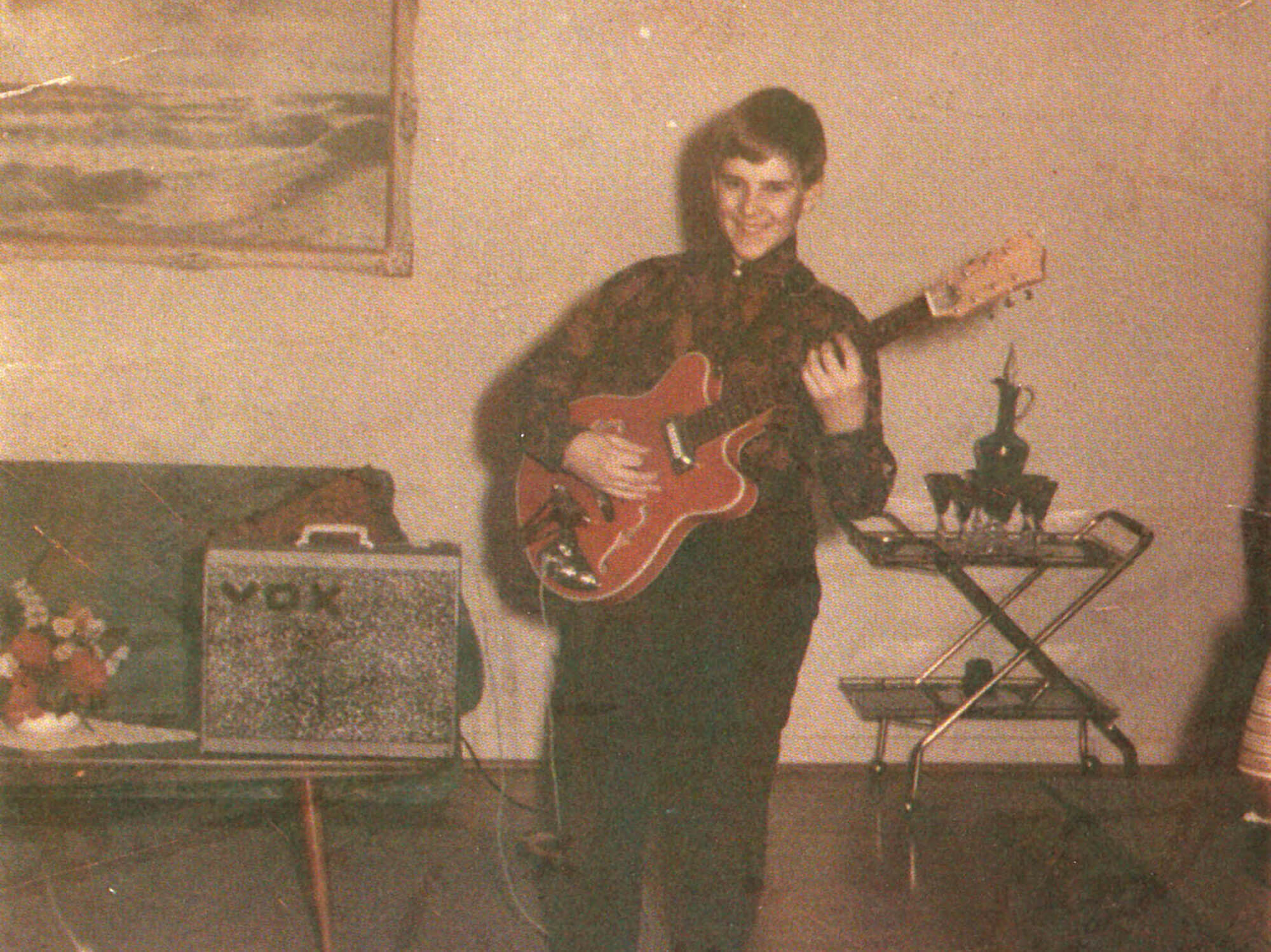 Alex Lifeson with his first guitar, the Canora
