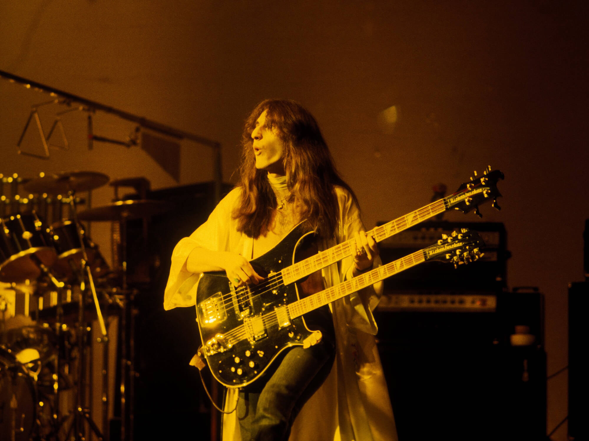 Geddy Lee of Rush, playing his Rickenbacker 4080 at All The World's A Stage