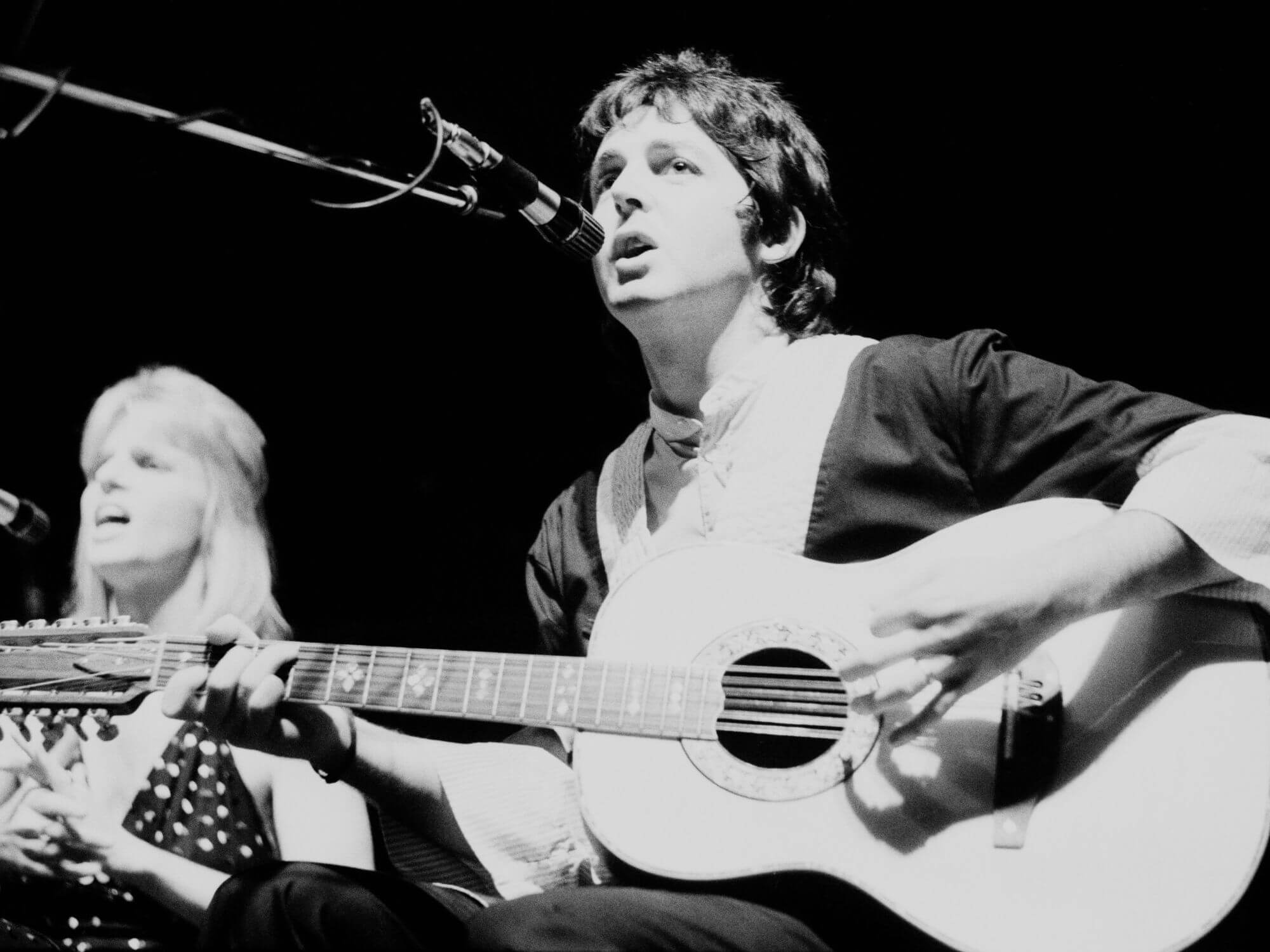 Paul and Linda McCartney performing together as part of Wings