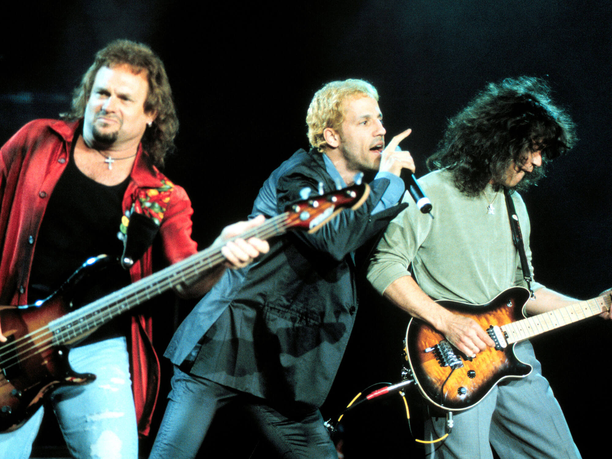 [L-R] Michael Anthony, Gary Cherone and Eddie Van Halen of Van Halen in 1999