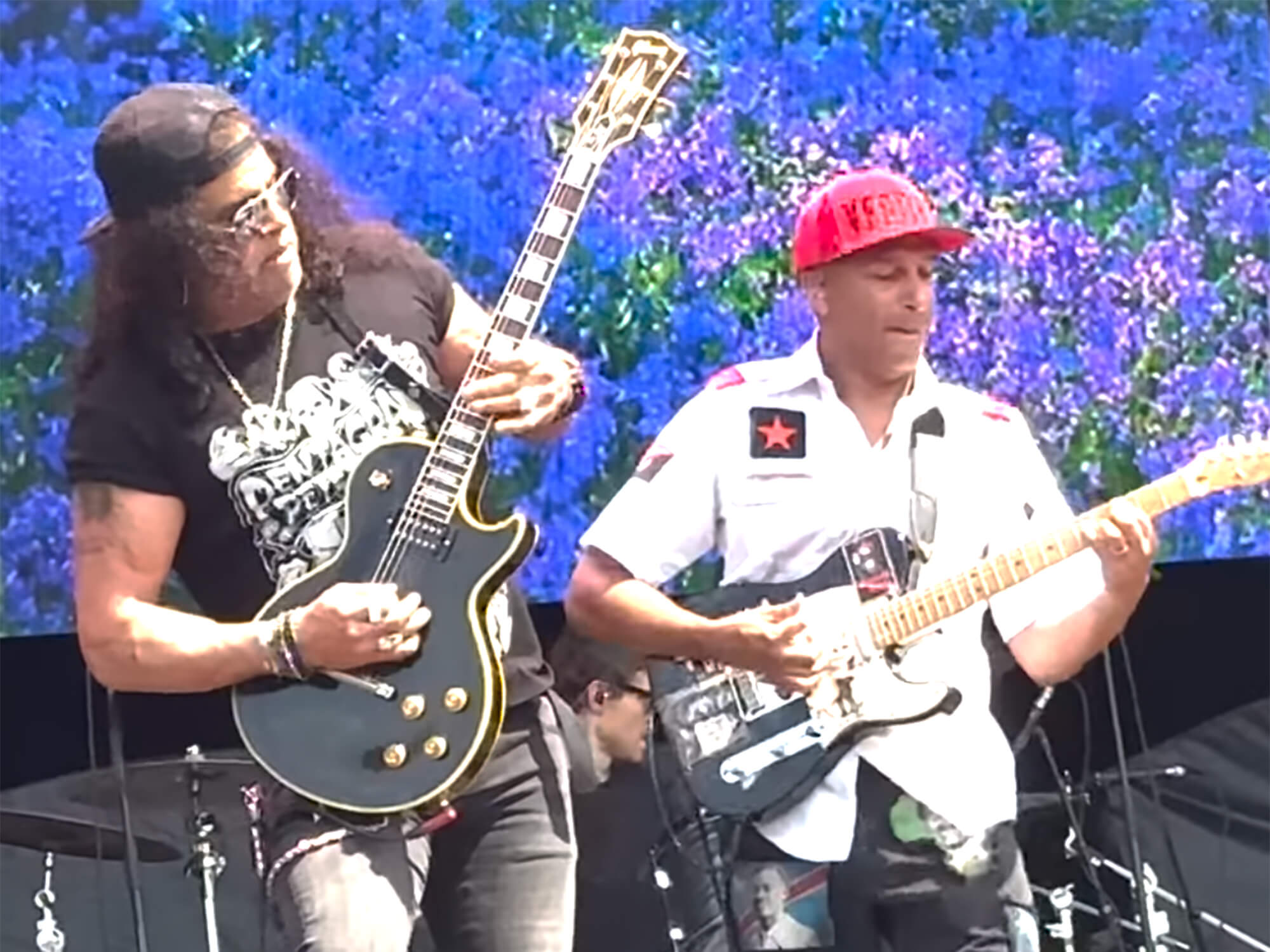 Watch Slash and Tom Morello's spicy Graspop guitar battle