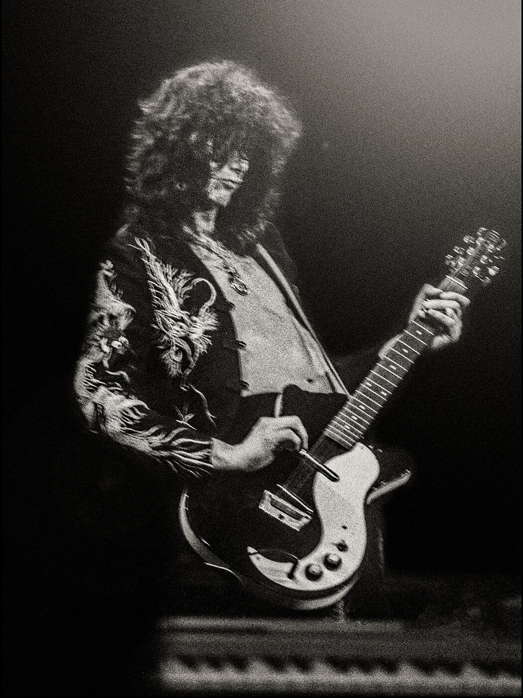 Jimmy Page playing a Danelectro DC-59 onstage in 1975