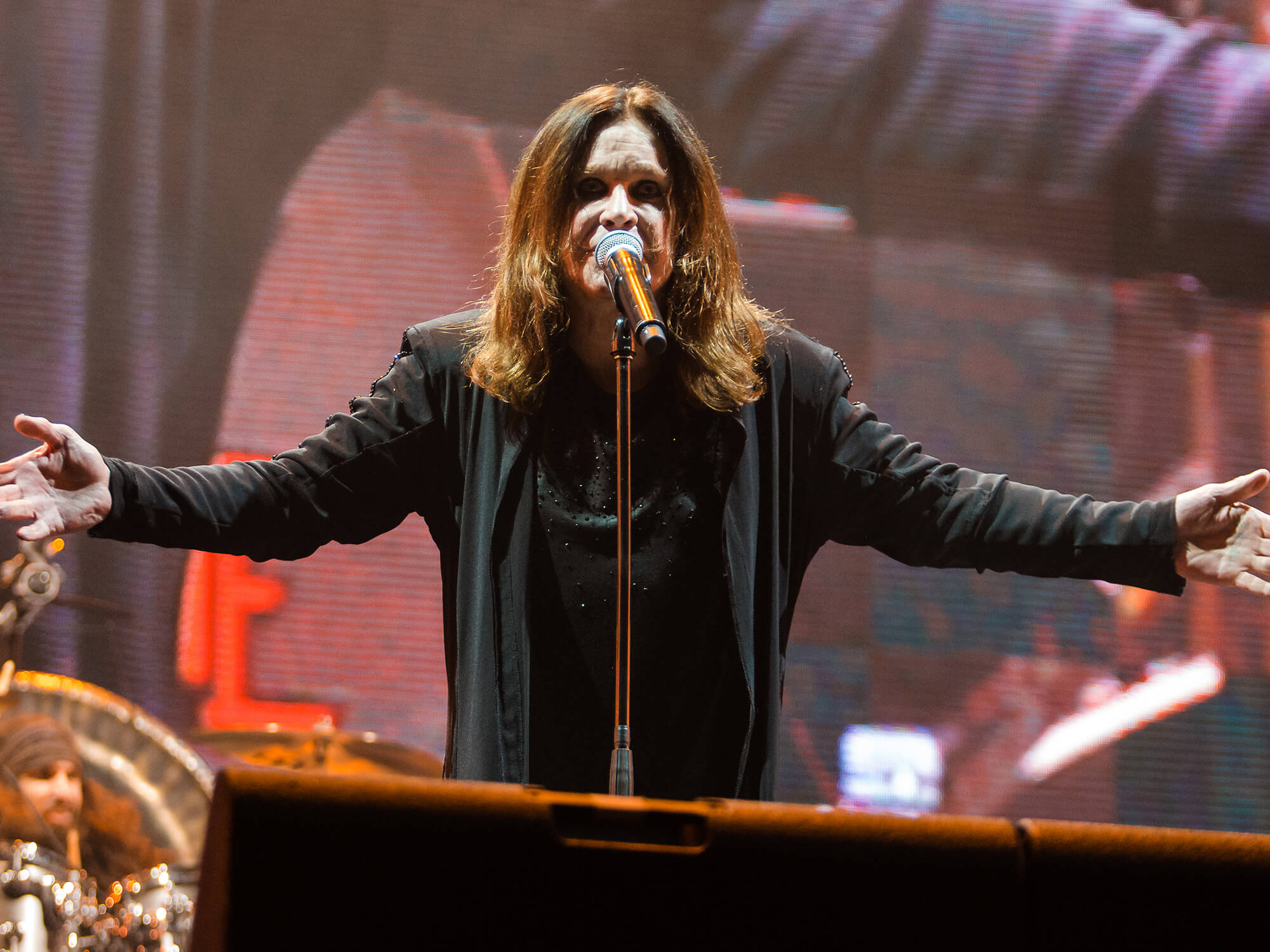 Ozzy Osbourne performing onstage
