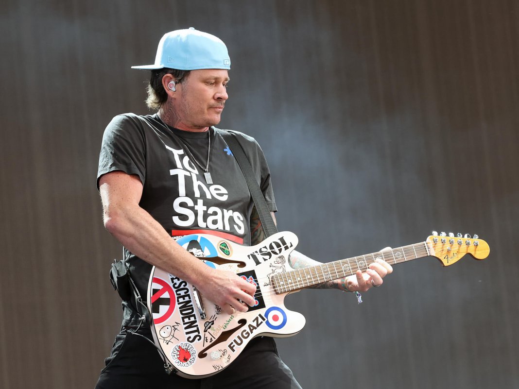Tom DeLonge says he writes everything on a “little shitty acoustic”