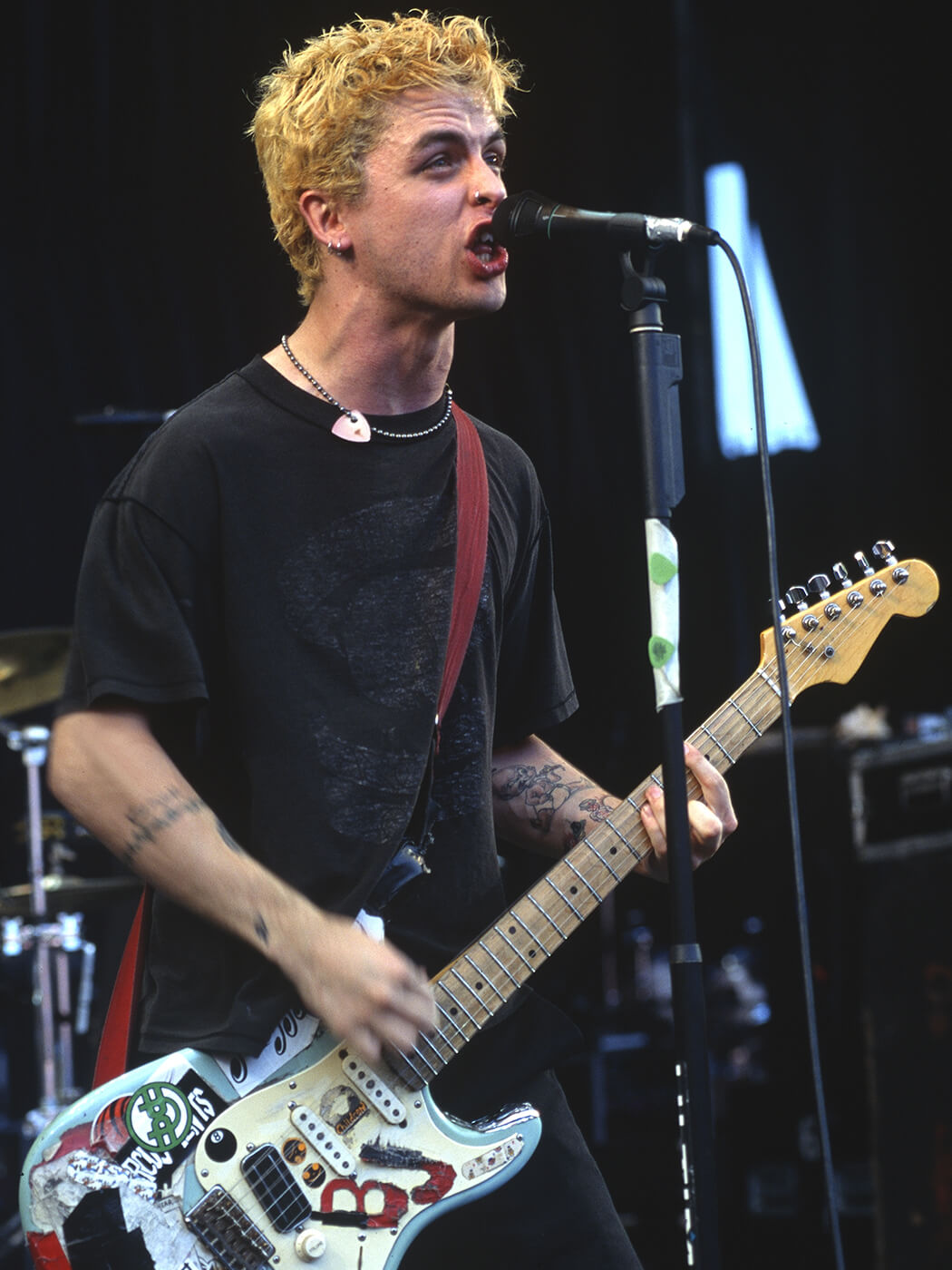 Billie Joe Armstrong of Green Day performing at Live 105's BFD in 1994 by Tim Mosenfelder/Getty Images