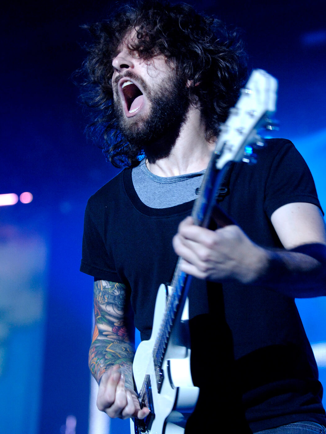 Joe Trohman of Fall Out Boy performing in San Jose, California, during the “The Young Wild Things Tour”, by Tim Mosenfelder/Getty Images