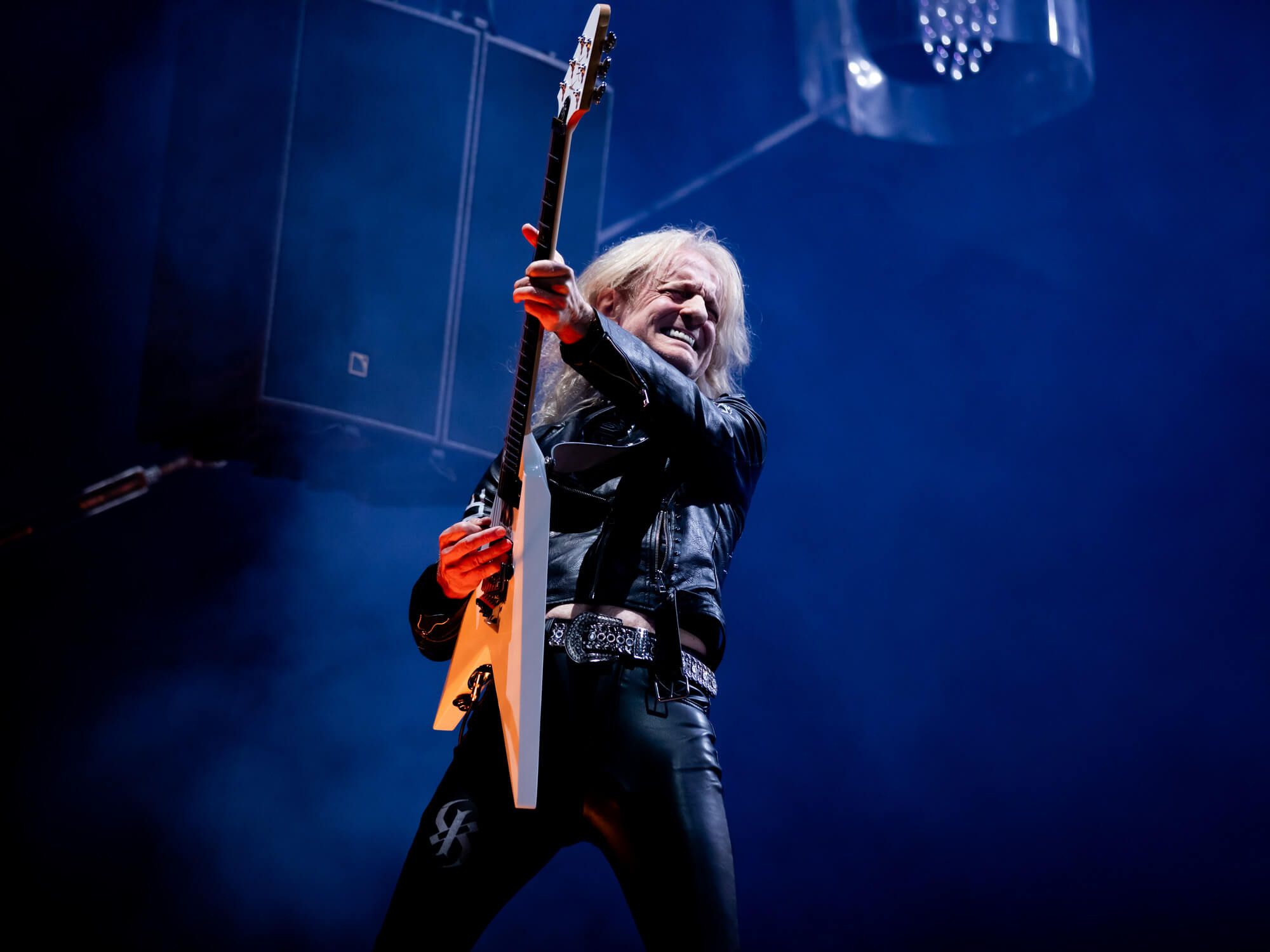 KK Downing performing on stage