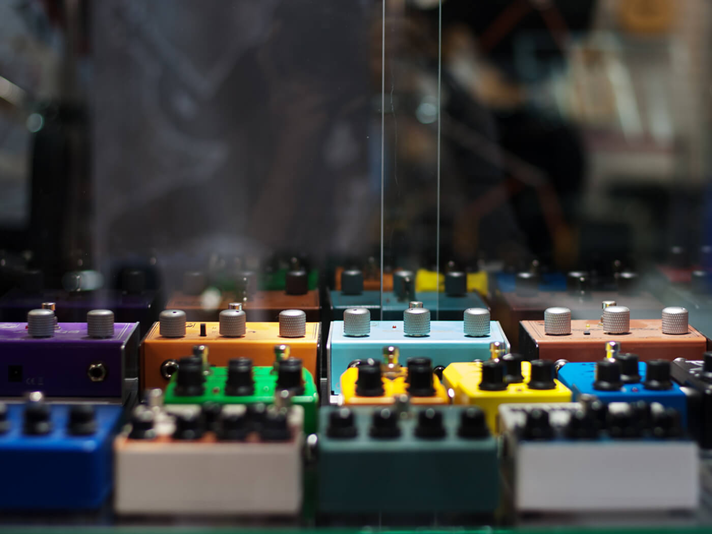 Guitar pedals on display at a music store, photo by Anastasia Prish/Getty Images
