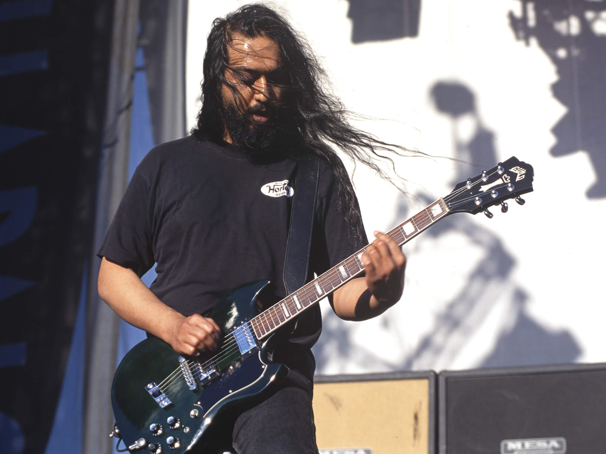 Kim Thayil of Soundgarden playing a Guild S-100 at Lollapalooza in 1996 by Tim Mosenfelder/Getty Images