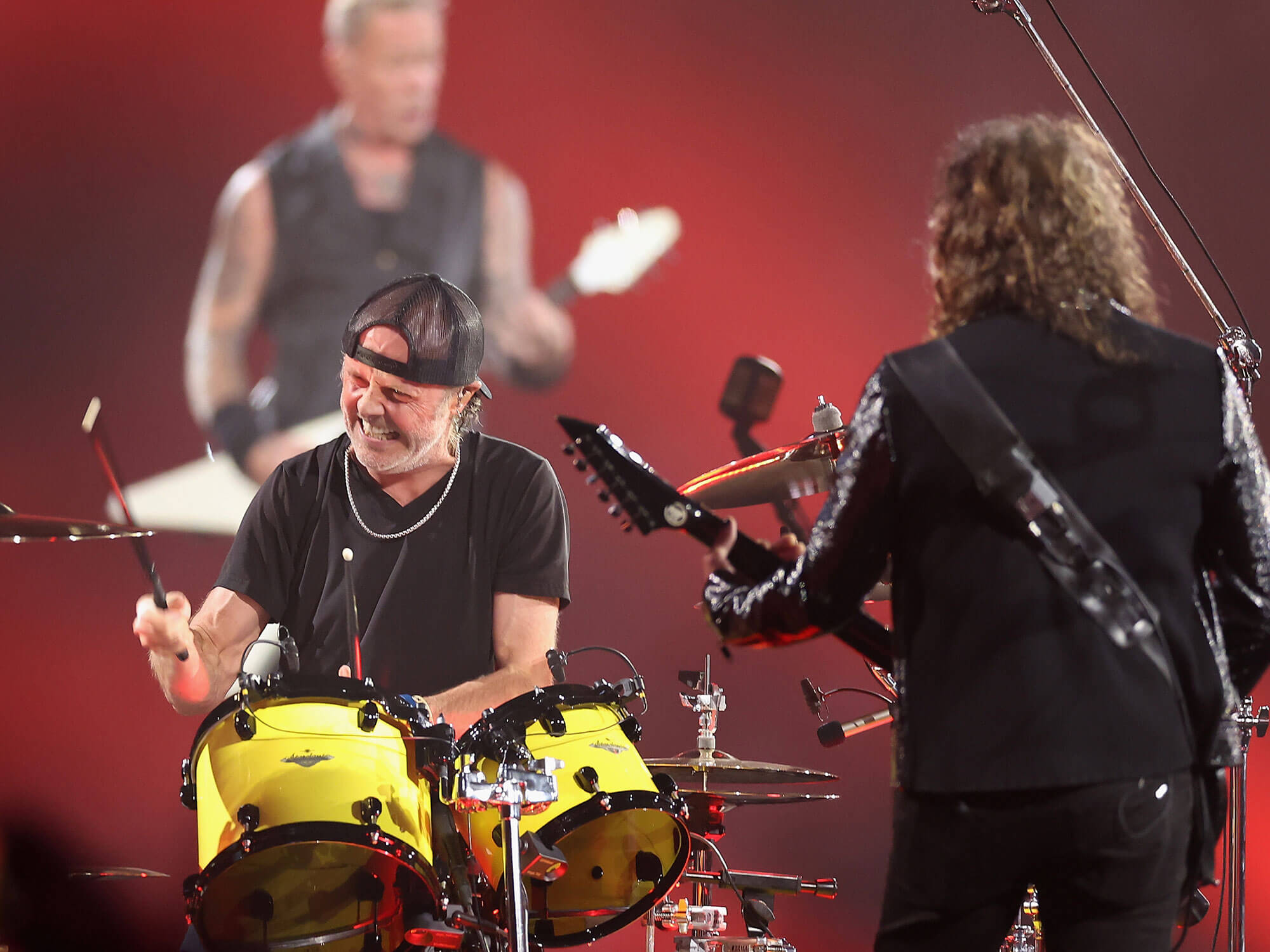 Lars Ulrich, James Hetfield and Kirk Hammett performing live