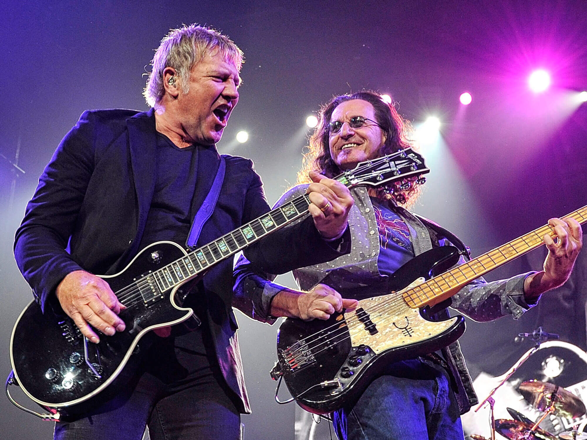 [L-R] Alex Lifeson and Geddy Lee performing live