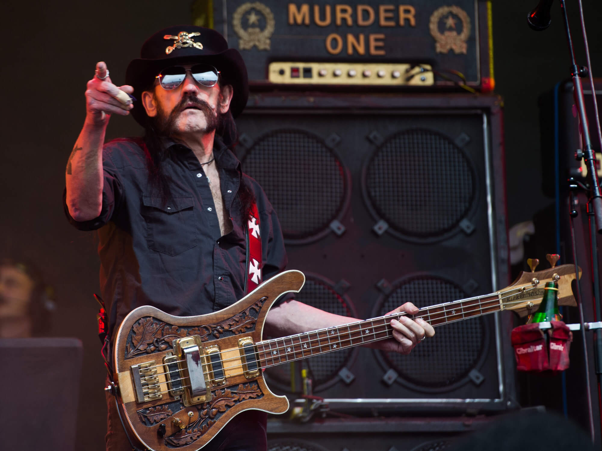 Lemmy playing guitar live at Glastonbury