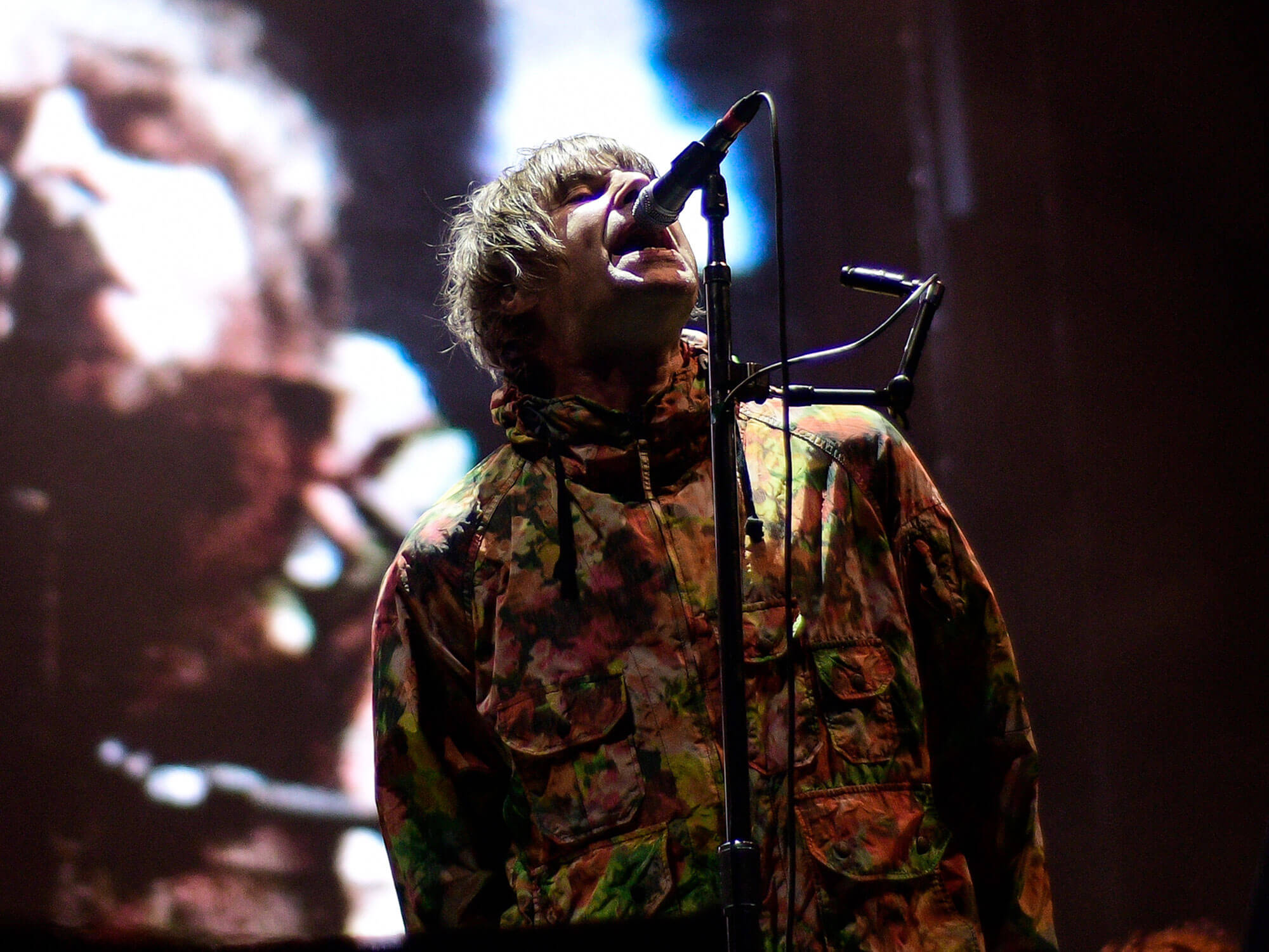 Liam Gallagher performing onstage