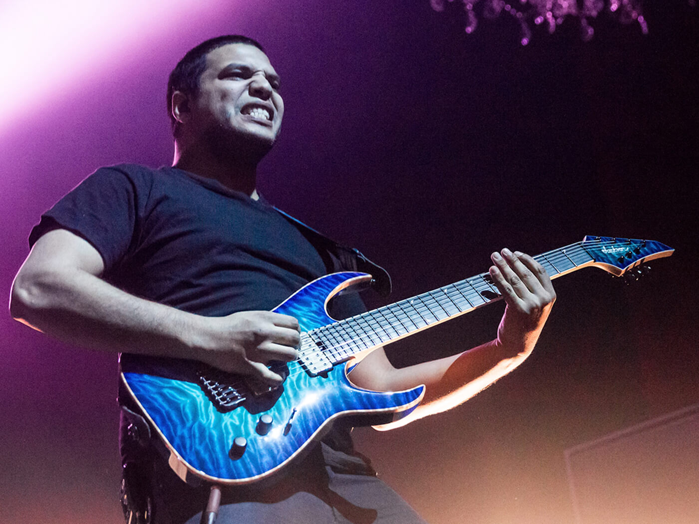 Misha Mansoor of Periphery performing with a Jackson guitar in 2015, photo by Miikka Skaffari/Getty Images