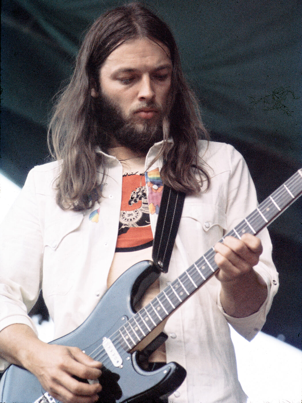 David Gilmour playing a black Stratocaster in 1974, photo by Chris Walter/WireImage via Getty Images
