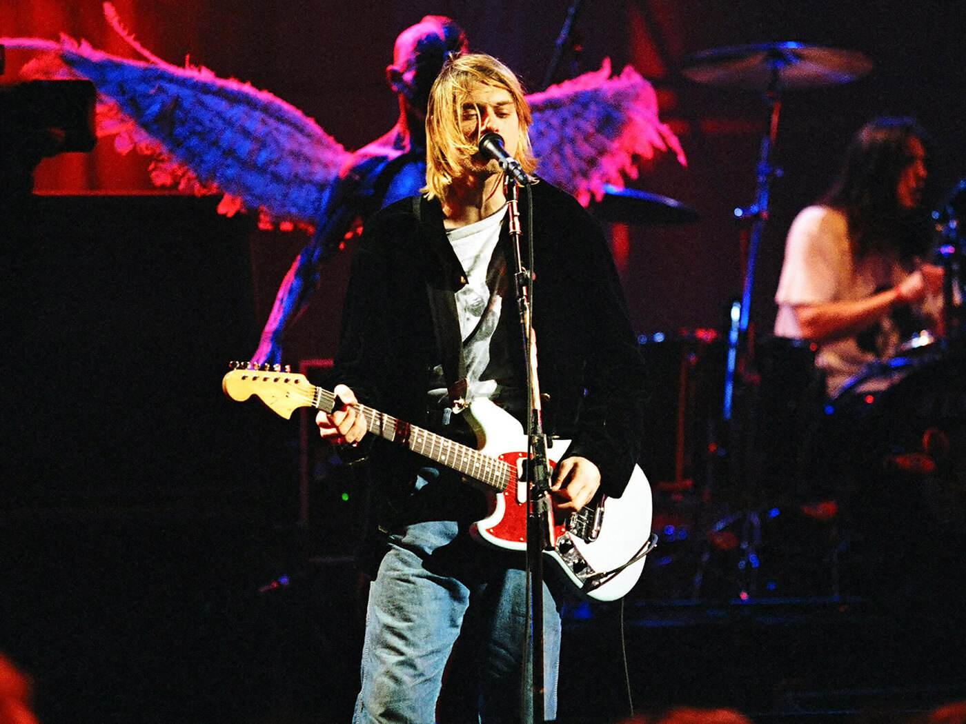 Kurt Cobain performing with Nirvana during MTV Live and Loud in 1993, photo by Jeff Kravitz/FilmMagic, Inc via Getty Images