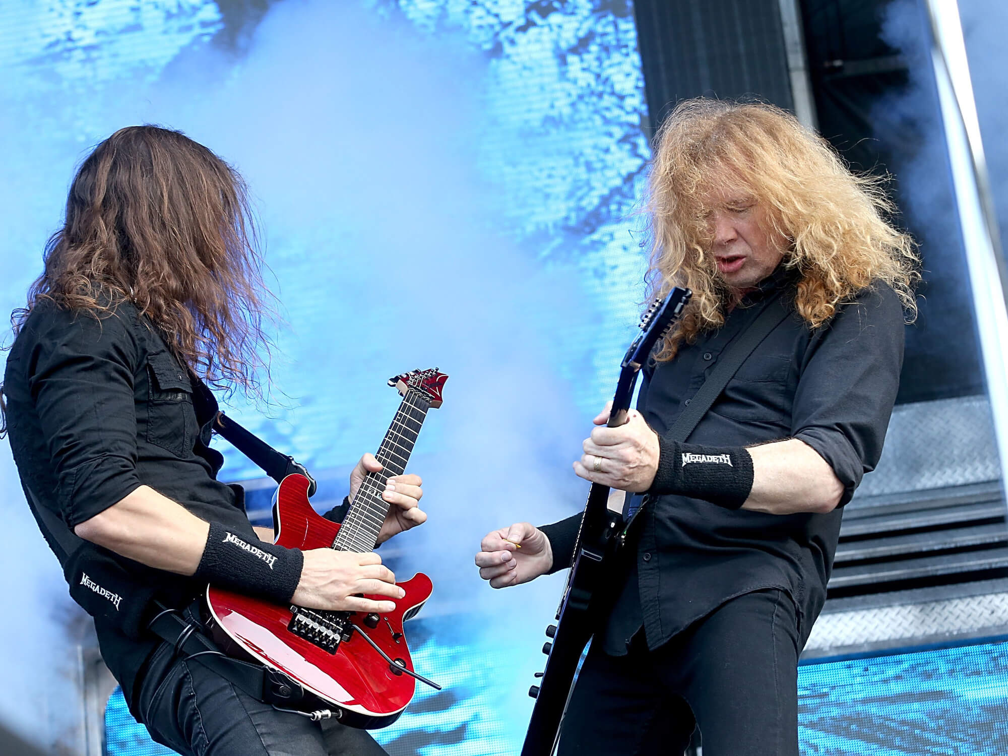 Kiko Loureiro and Dave Mustaine playing guitar
