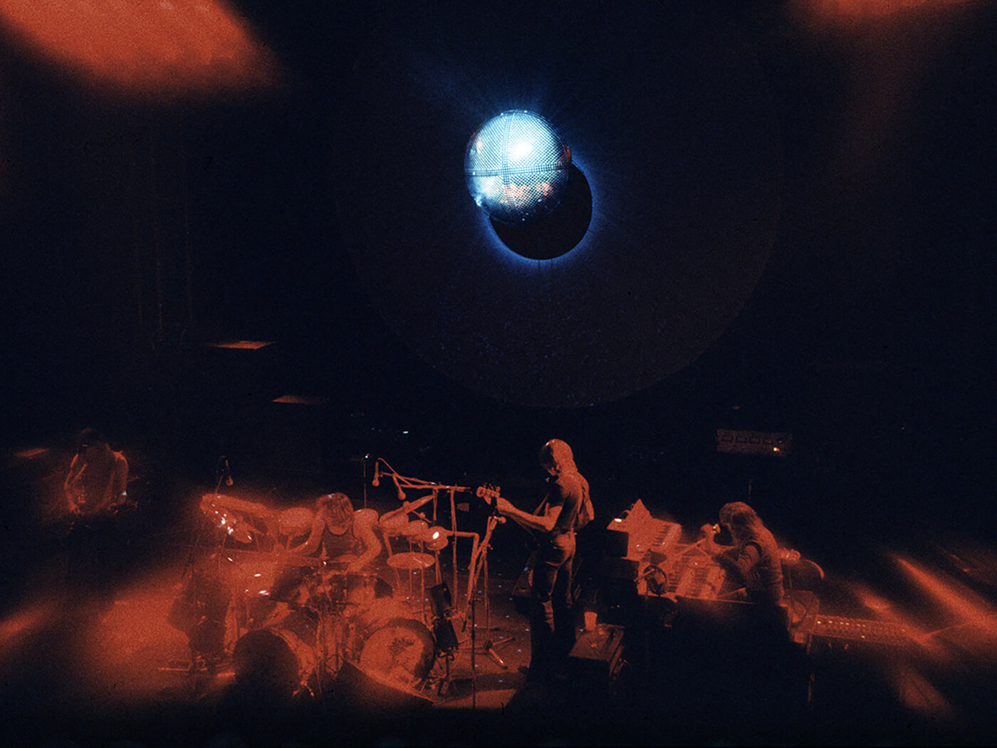 Pink Floyd performing onstage in 1972, photo by Michael Putland/Getty Images