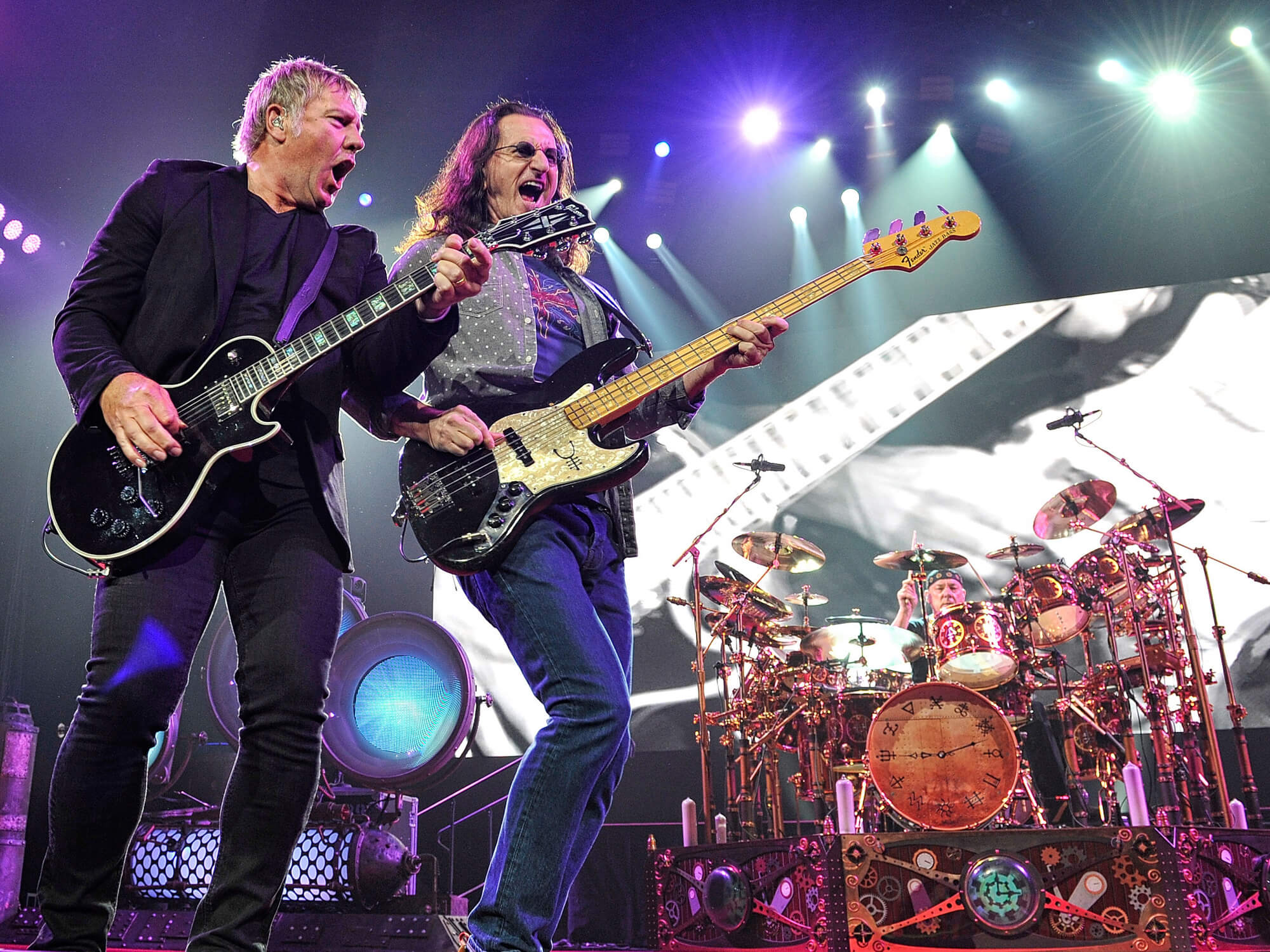Guitarist Alex Lifeson, bassist Geddy Lee, and drummer Neil Peart of Rush
