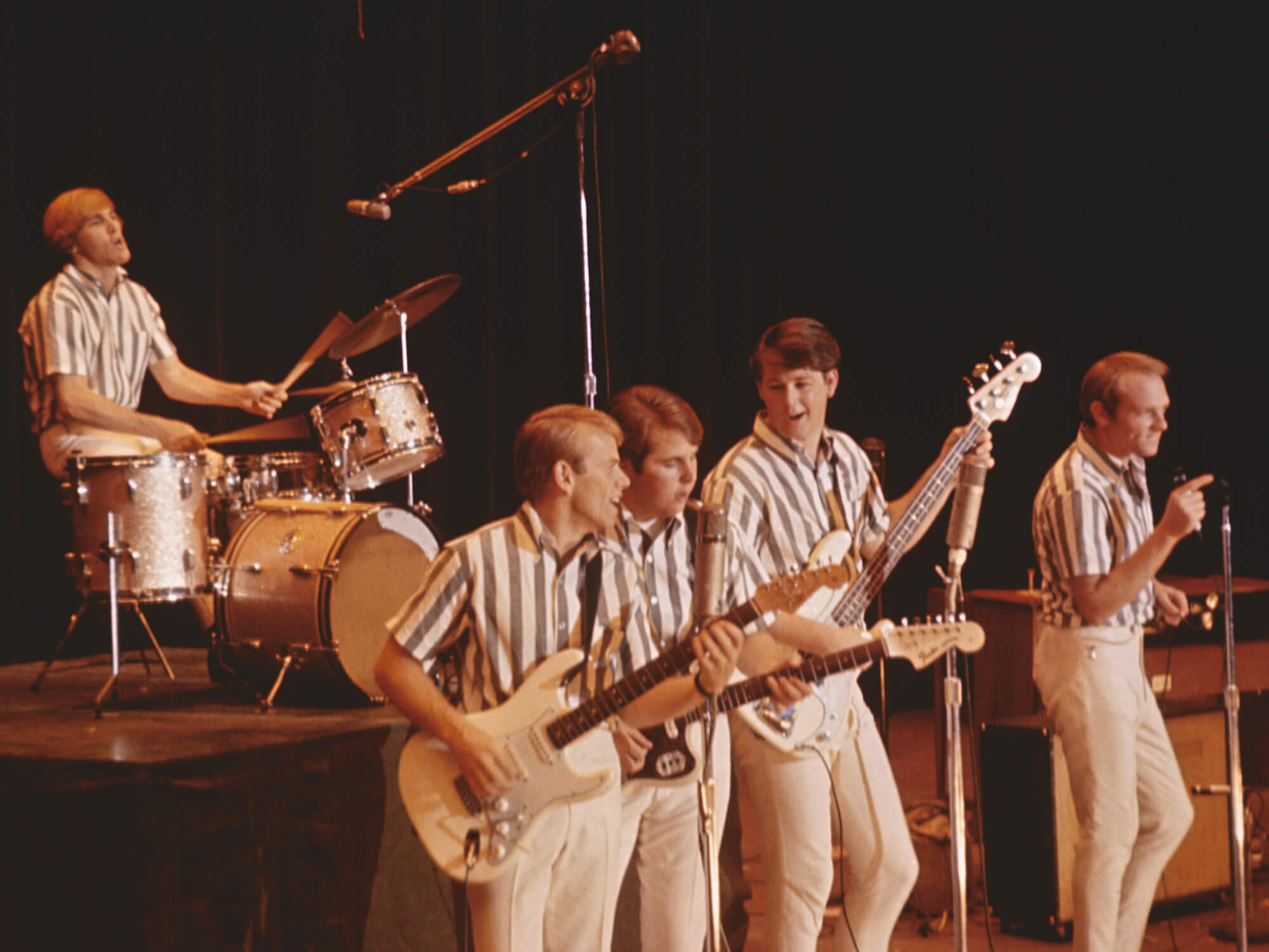 The Beach Boys performing onstage in California, 1964, photo by Michael Ochs Archives/Getty Images