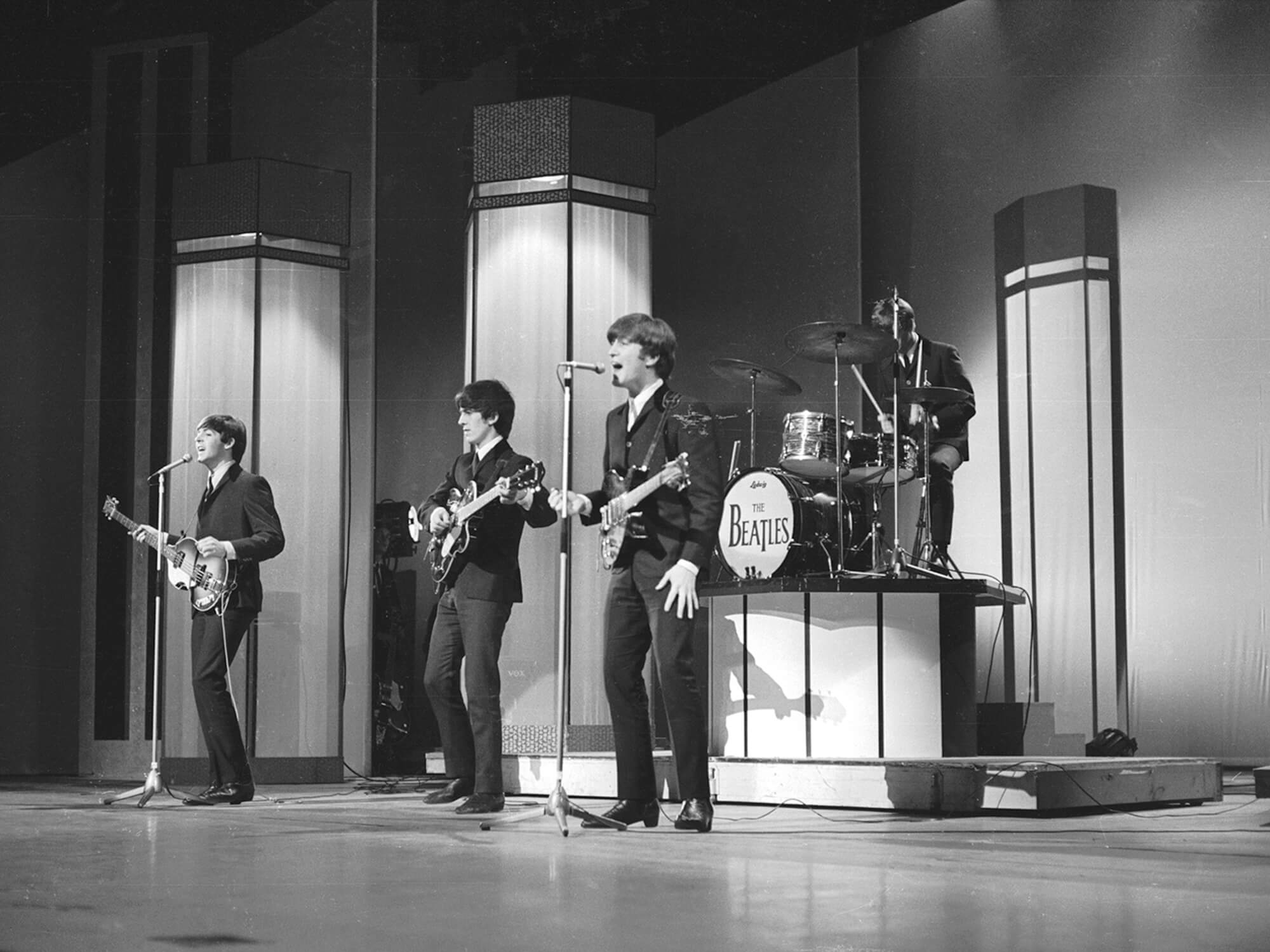 The Beatles performing in 1965, photo by Les Lee/Express via Getty Images