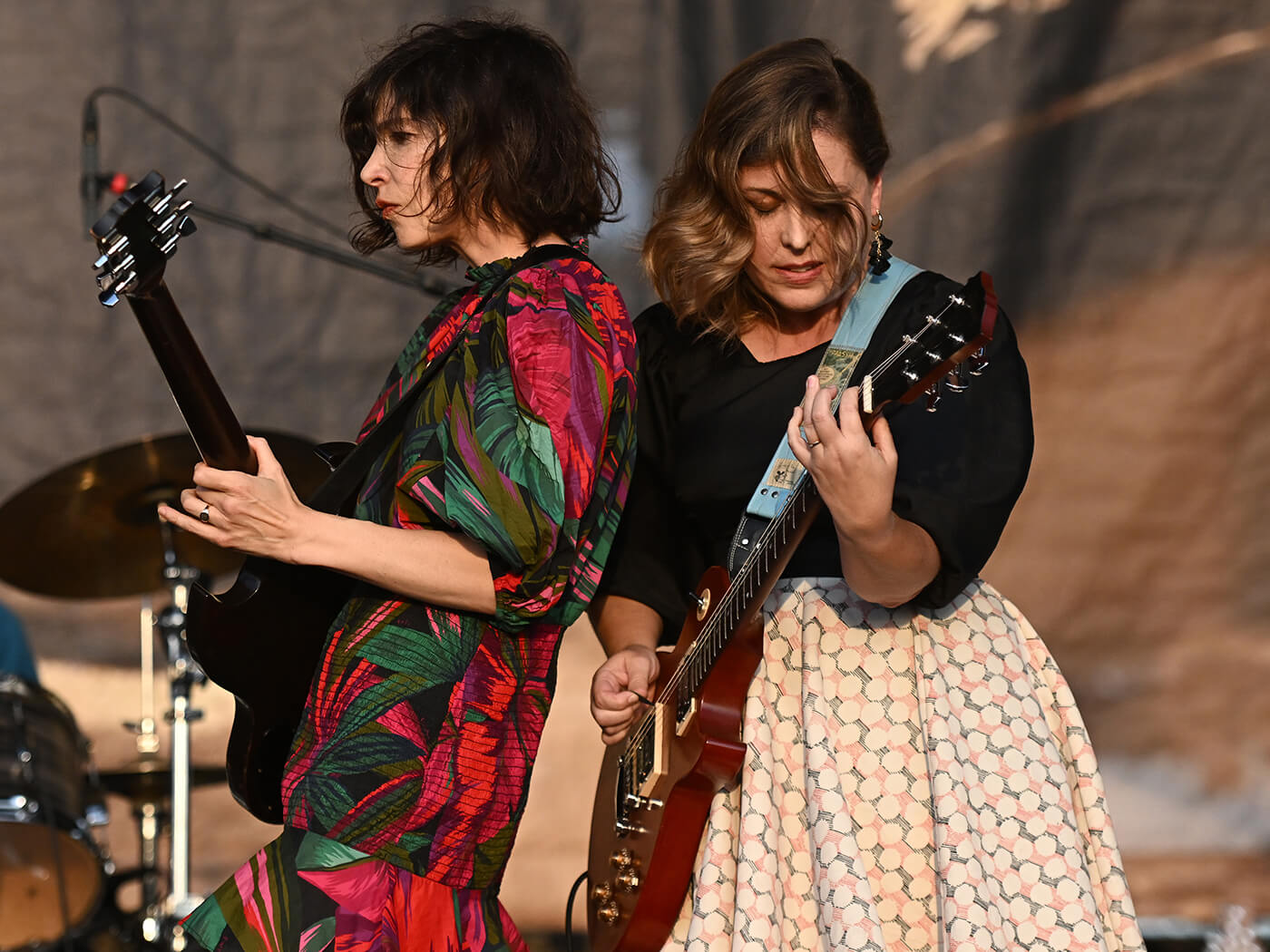 Carrie Brownstein and Corin Tucker of Sleater-Kinney performing at Riot Fest 2022, photo by Daniel Boczarski/Getty Images