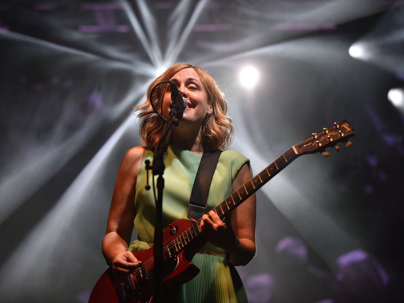 Corin Tucker of Sleater-Kinney performing with a Gibson Les Paul in 2016, photo by Thomas Cooper/WireImage via Getty Images