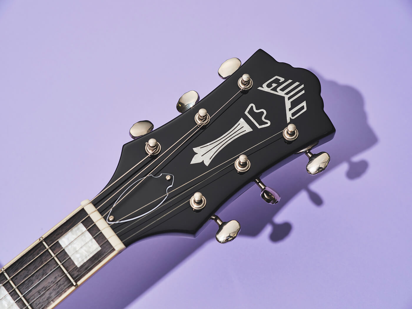 Headstock of the Guild Polara Deluxe in canyon dusk, photo by Adam Gasson