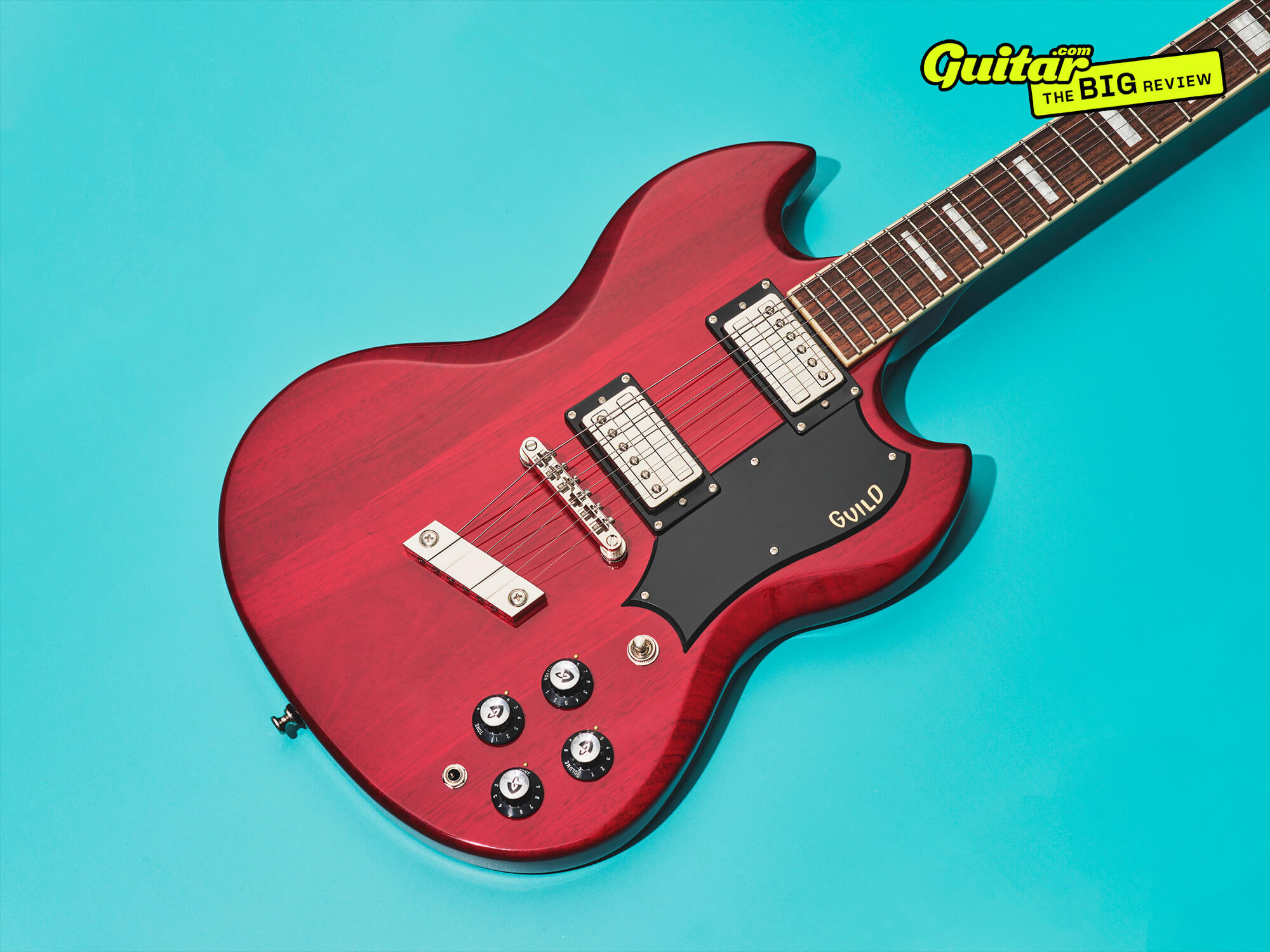 Guild Polara Deluxe in cherry red, photo by Adam Gasson