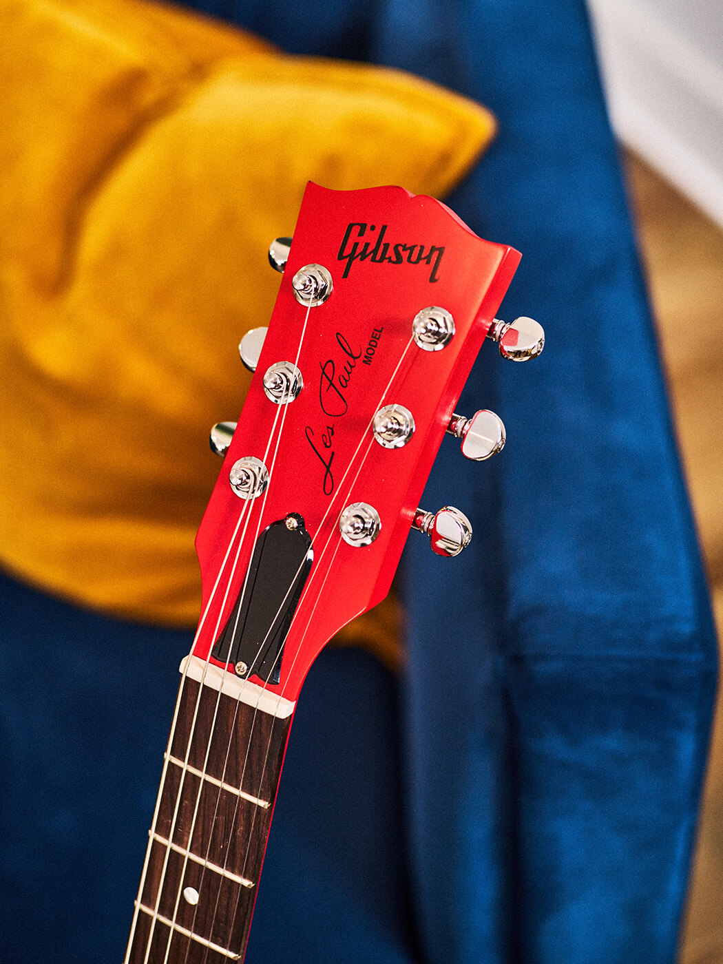 Headstock of the Gibson Les Paul Modern Lite in Cardinal Red Satin