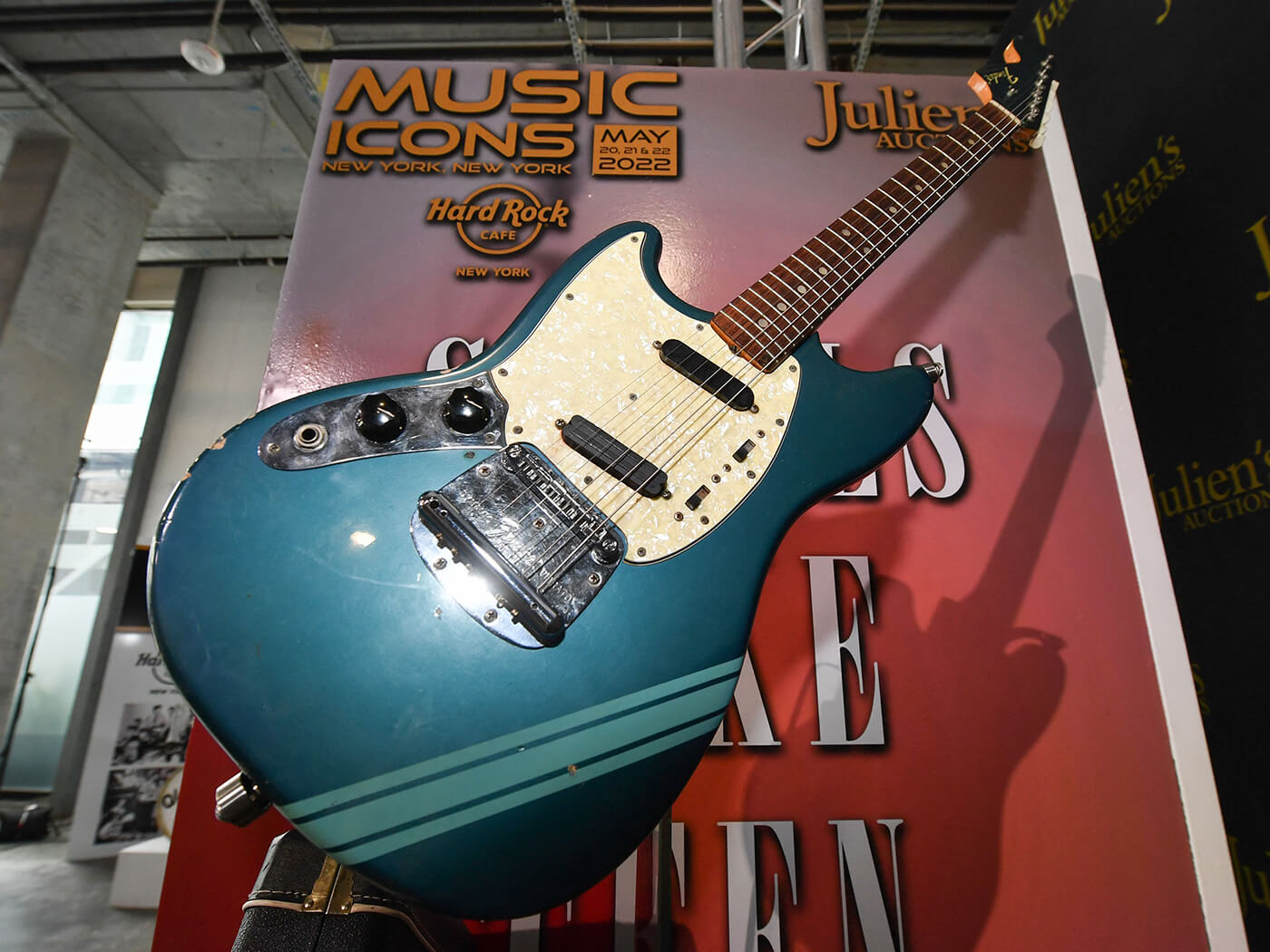 Kurt Cobain’s 1969 blue Fender Mustang on display, photo by Robyn Beck/AFP via Getty Images
