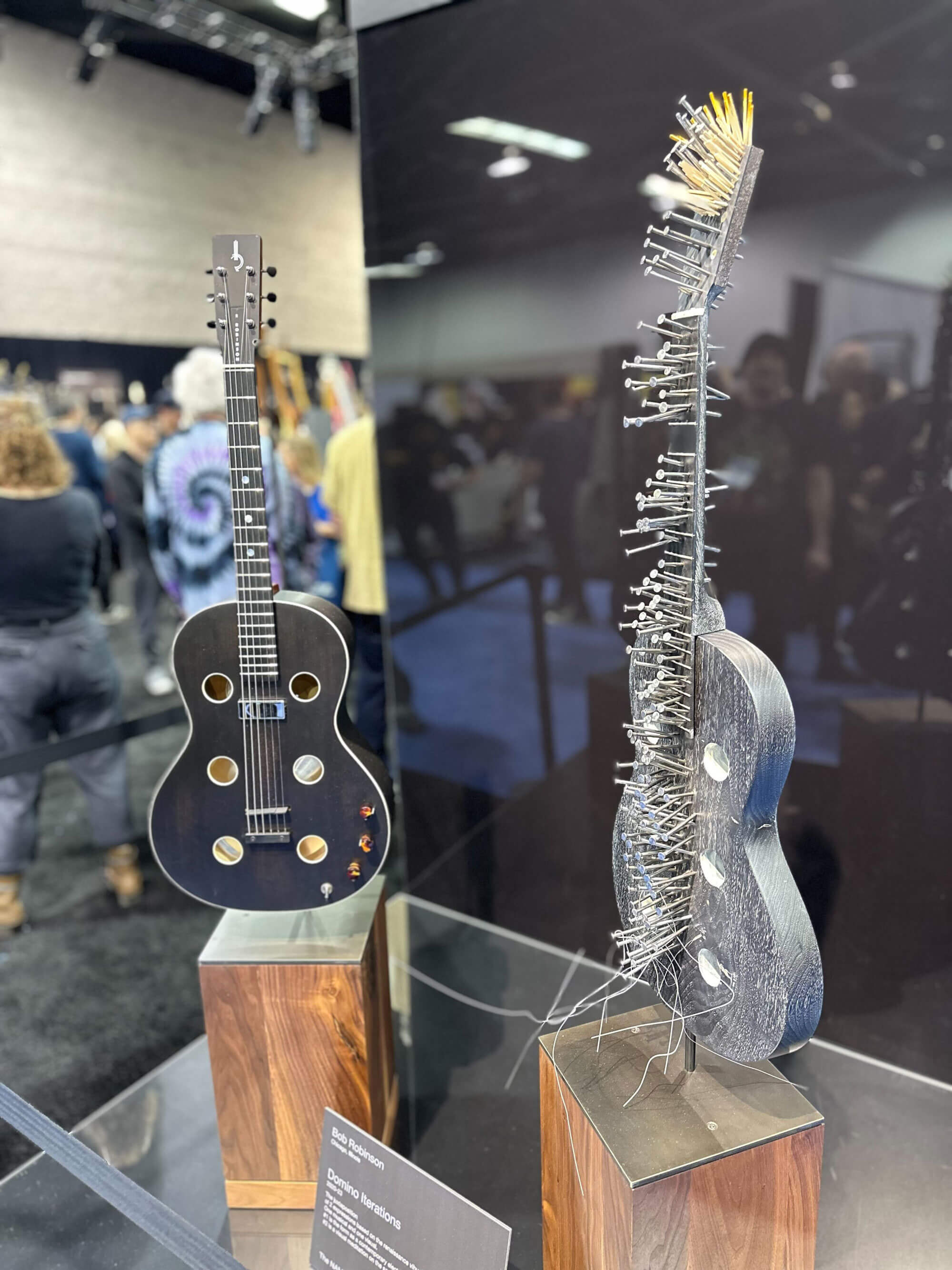 Nail guitar on display at NAMM