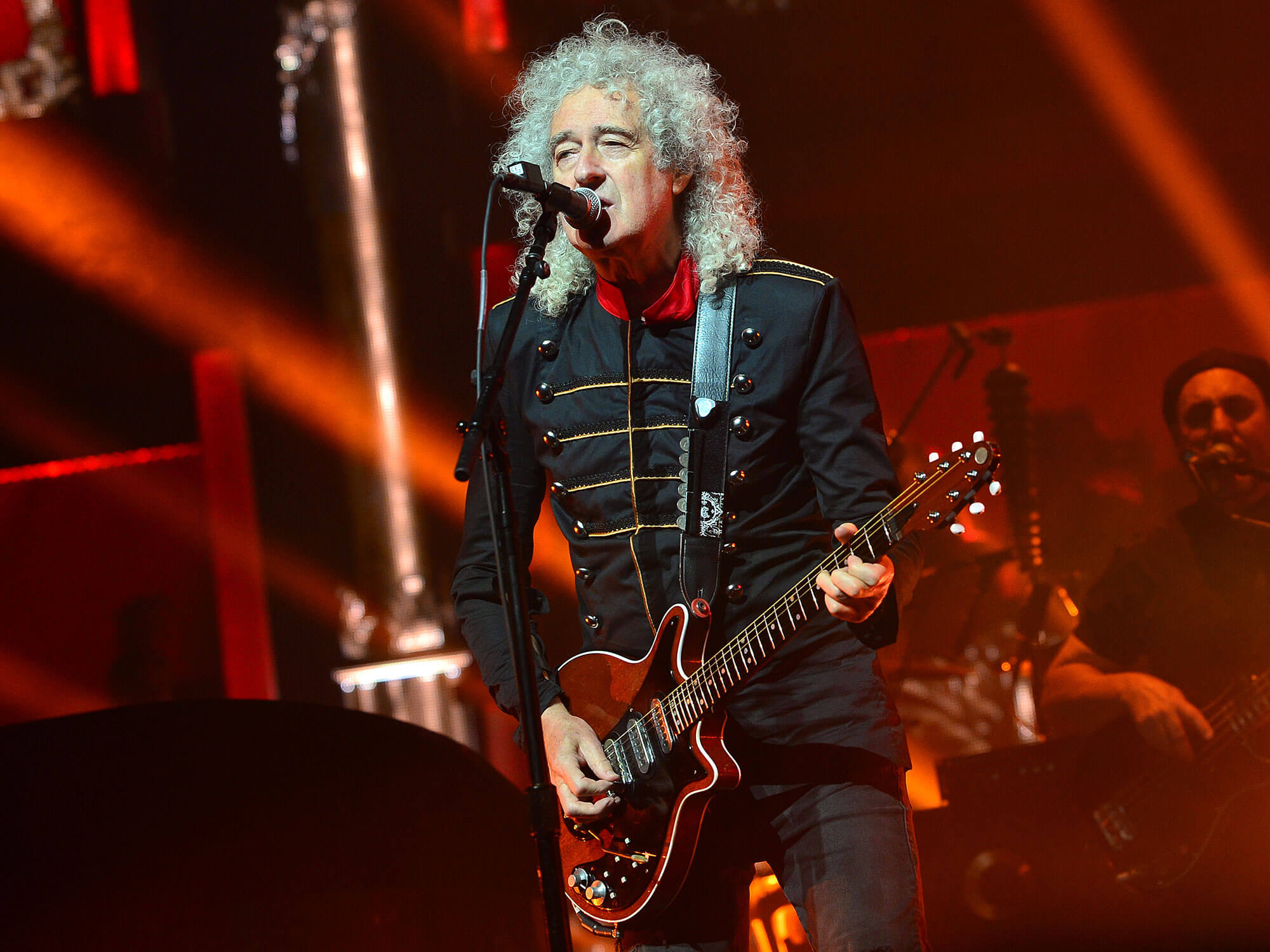 Brian May performing onstage