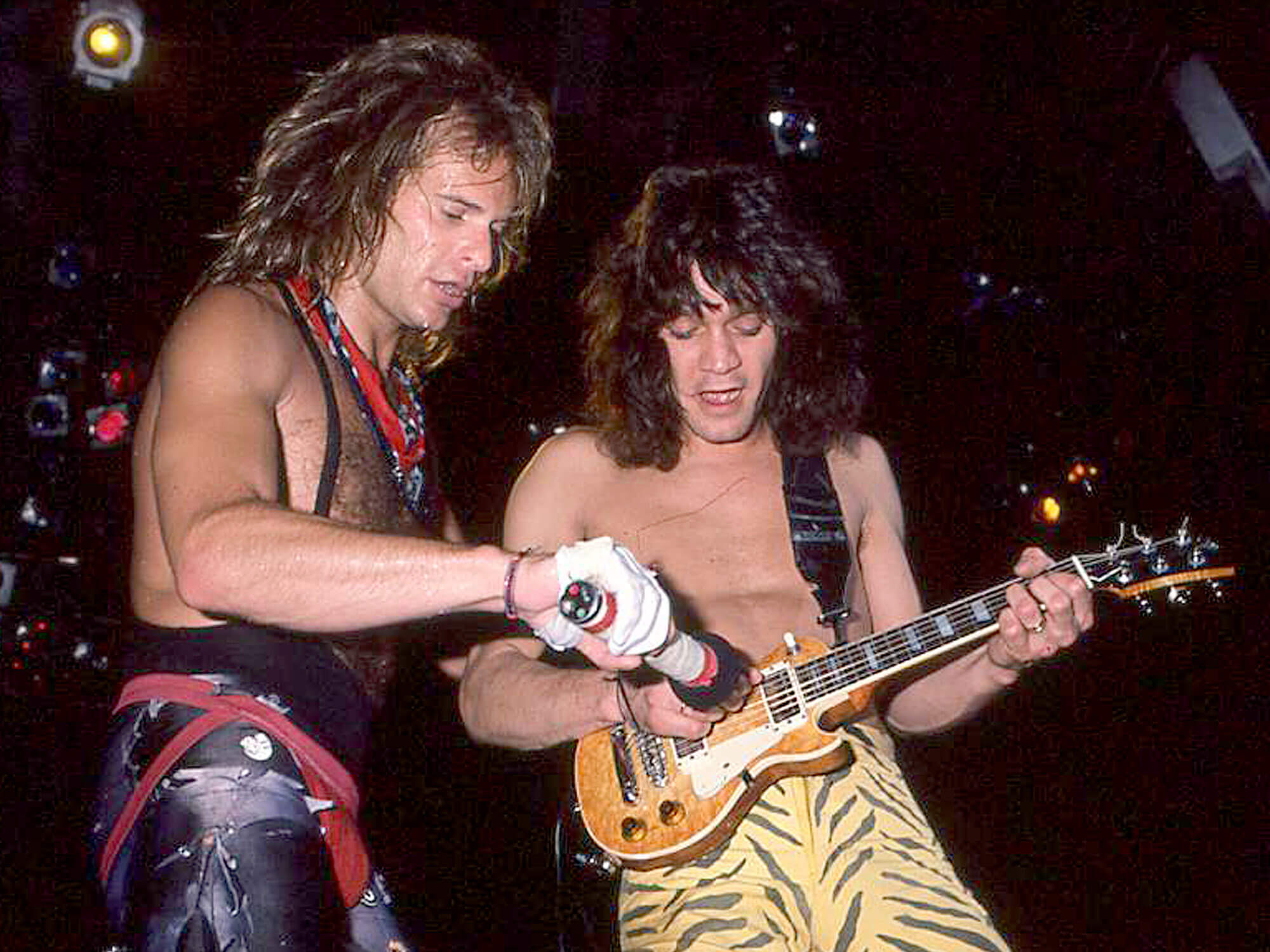 [L-R] David Lee Roth and Eddie Van Halen performing with Van Halen in 1984.