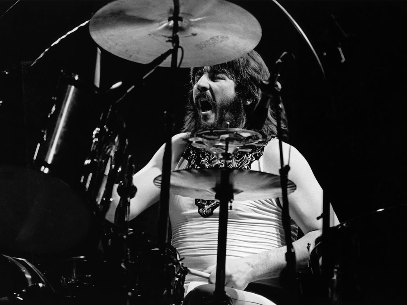 John Bonham performing with Led Zeppelin in 1977, photo by Richard E. Aaron/Redferns via Getty Images