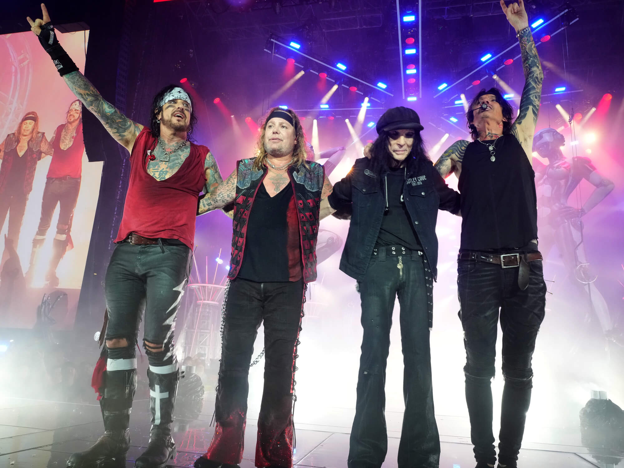 Nikki Sixx, Vince Neil, Mick Mars and Tommy Lee of Mötley Crüe perform onstage