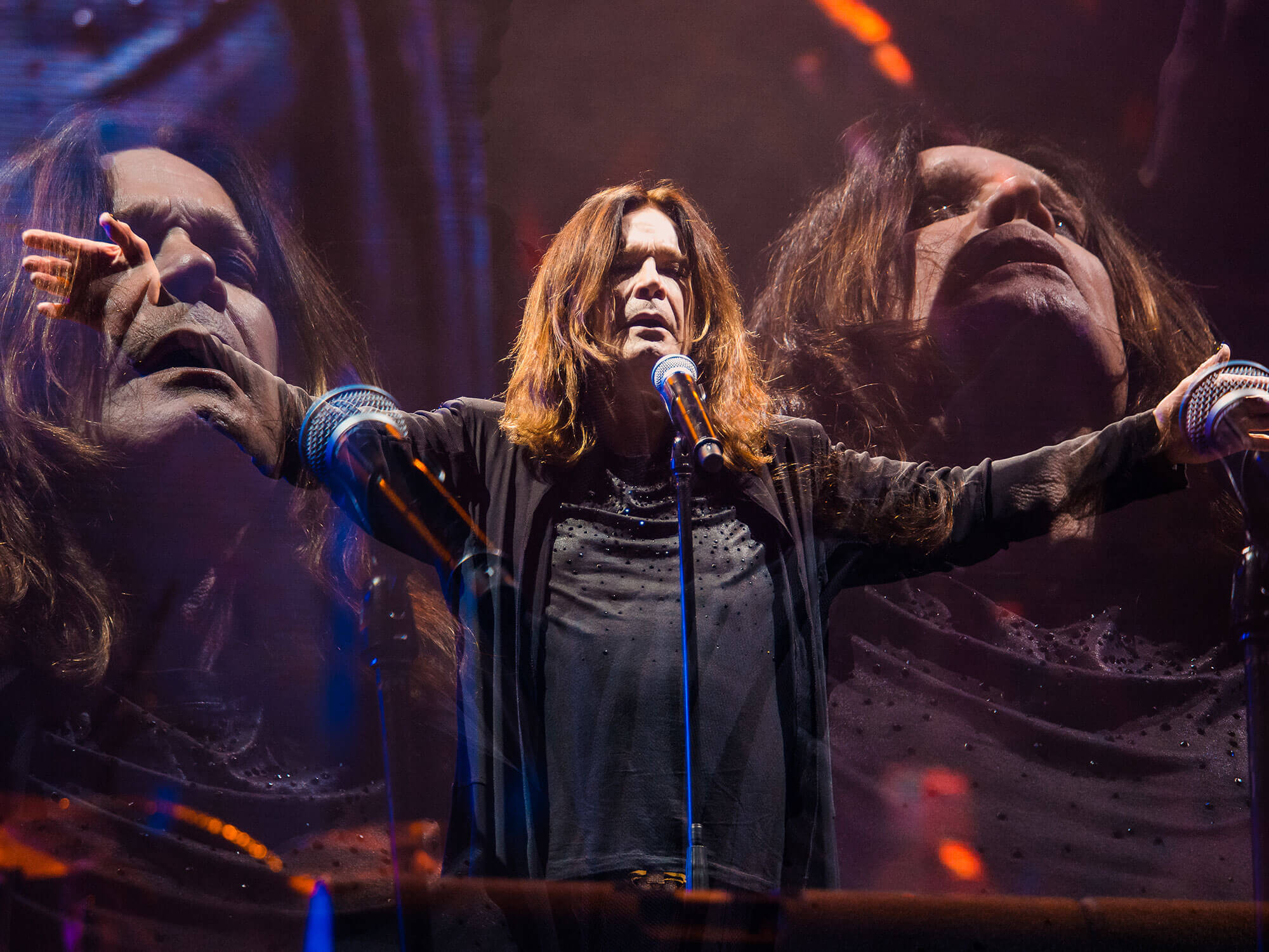 Ozzy Osbourne performing onstage