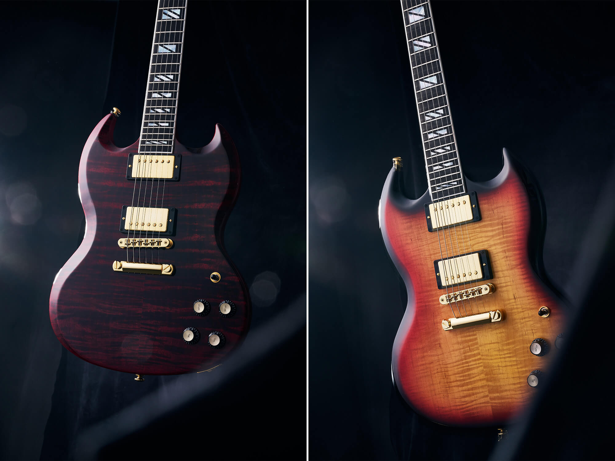 SG Supreme models in Wine Red and Fireburst. They are photographed on a black silk-like background.