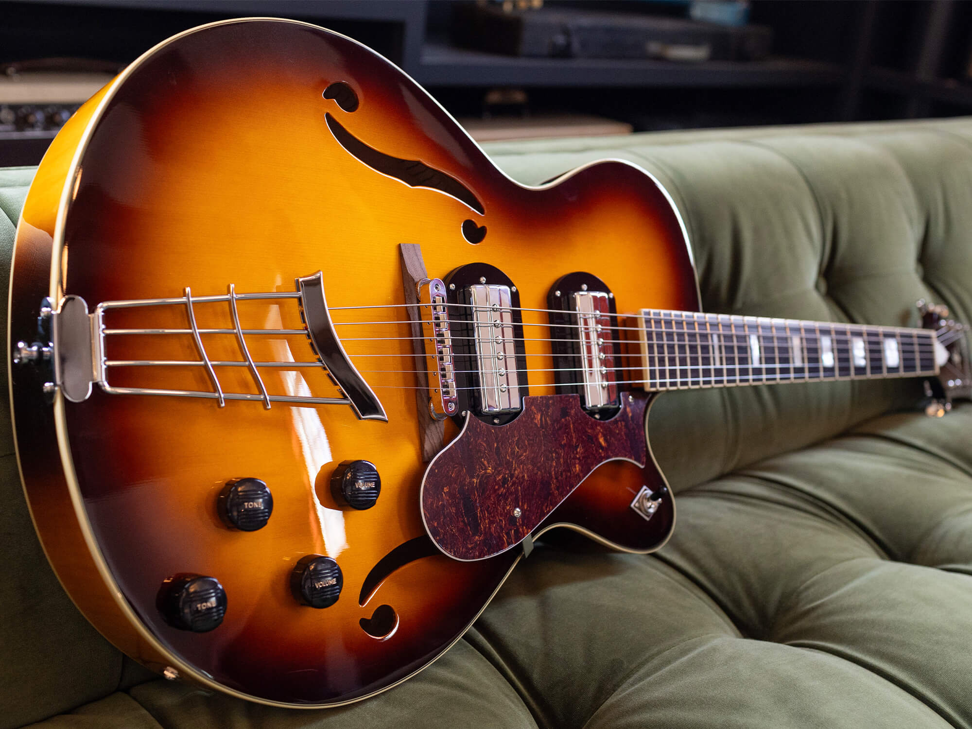 A close up shot of the H62. It is in a classic Sunburst finish and shows two F holes.