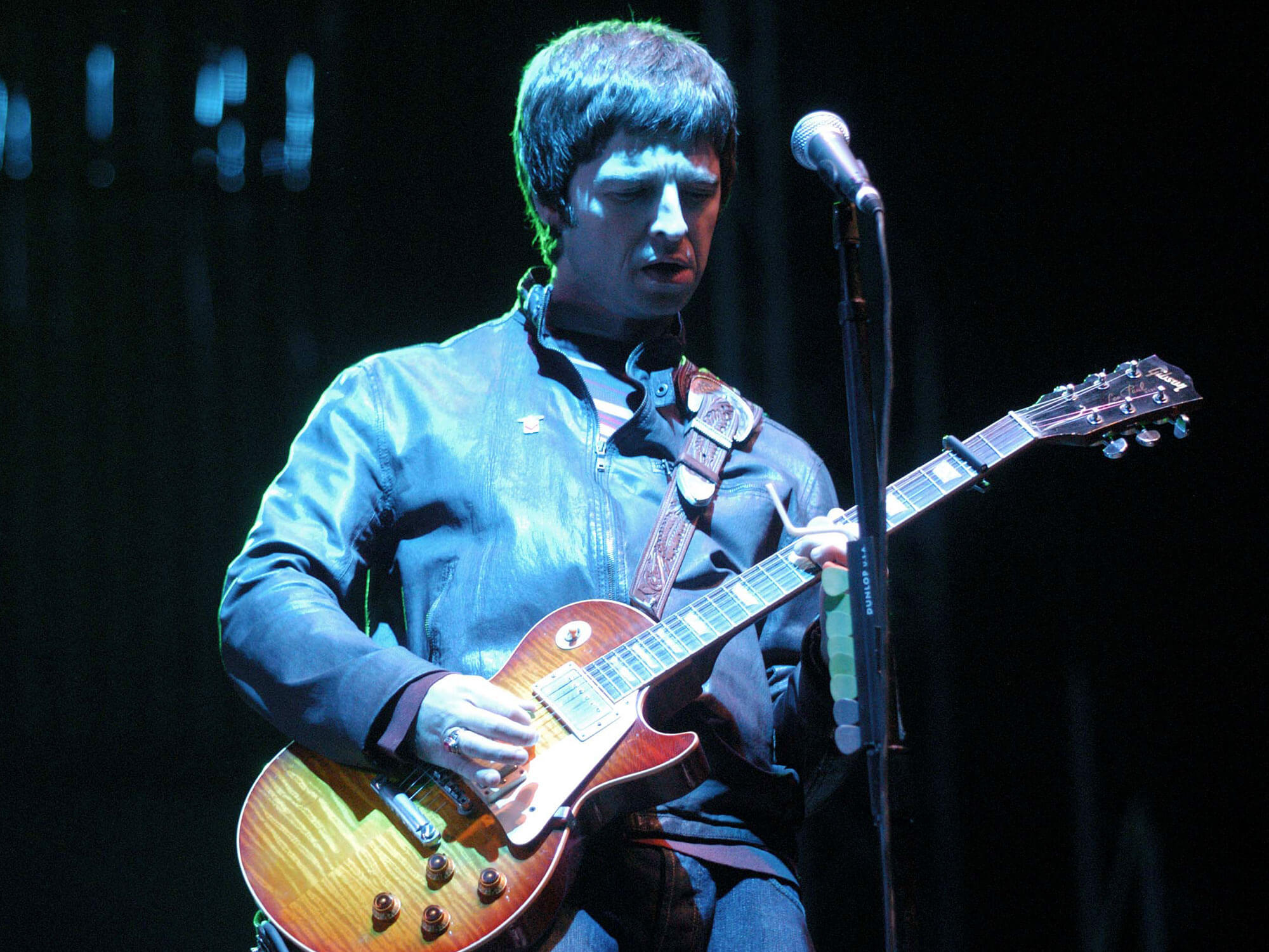 Noel Gallagher performing live with a Gibson Les Paul
