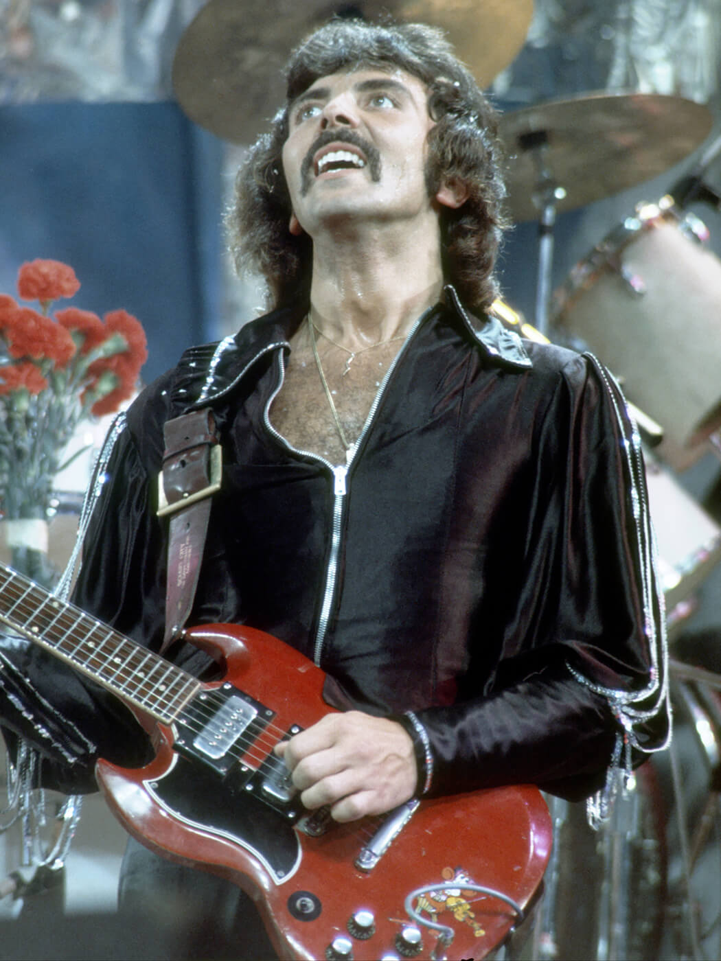 Tony Iommi performing with Black Sabbath in 1970. He plays a Gibson SG, photo by Michael Ochs Archives/Stringer via Getty Images