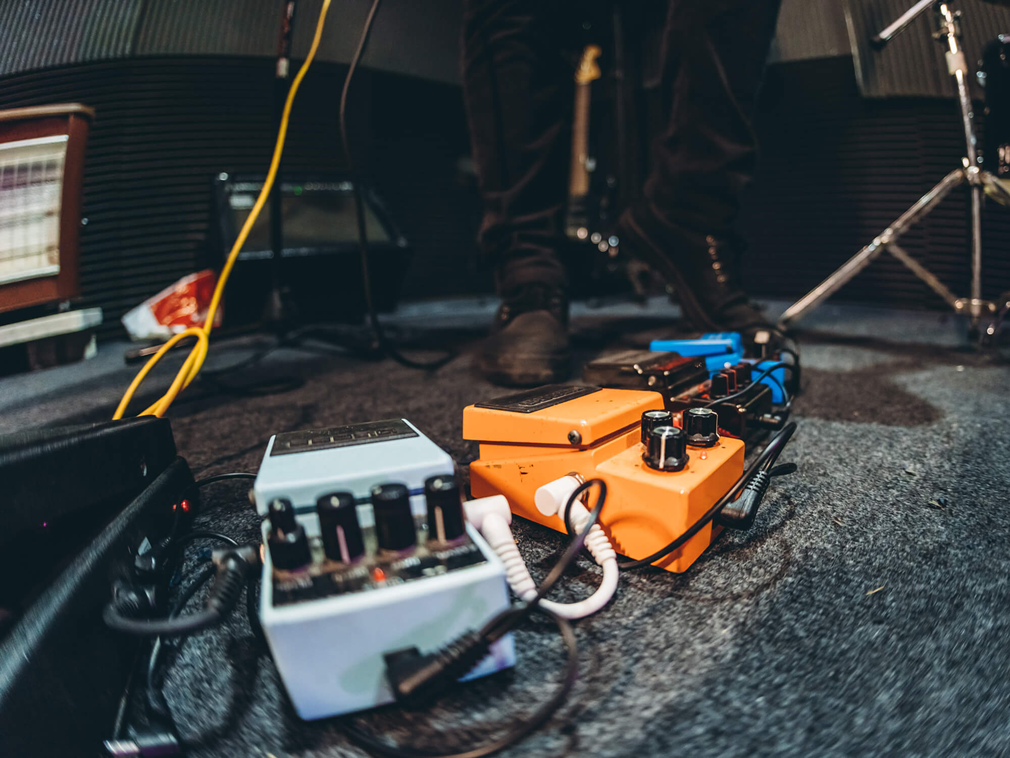 Guitar pedals on the floor in a studio, photo by Urbazon/Getty Images