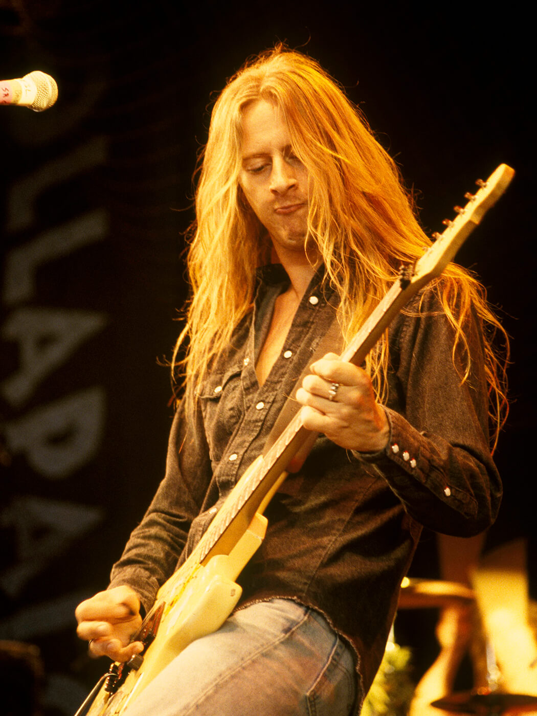 Jerry Cantrell performing with Alice in Chains at Lollapalooza in 1993, photo by John Lynn Kirk/Redferns via Getty Images
